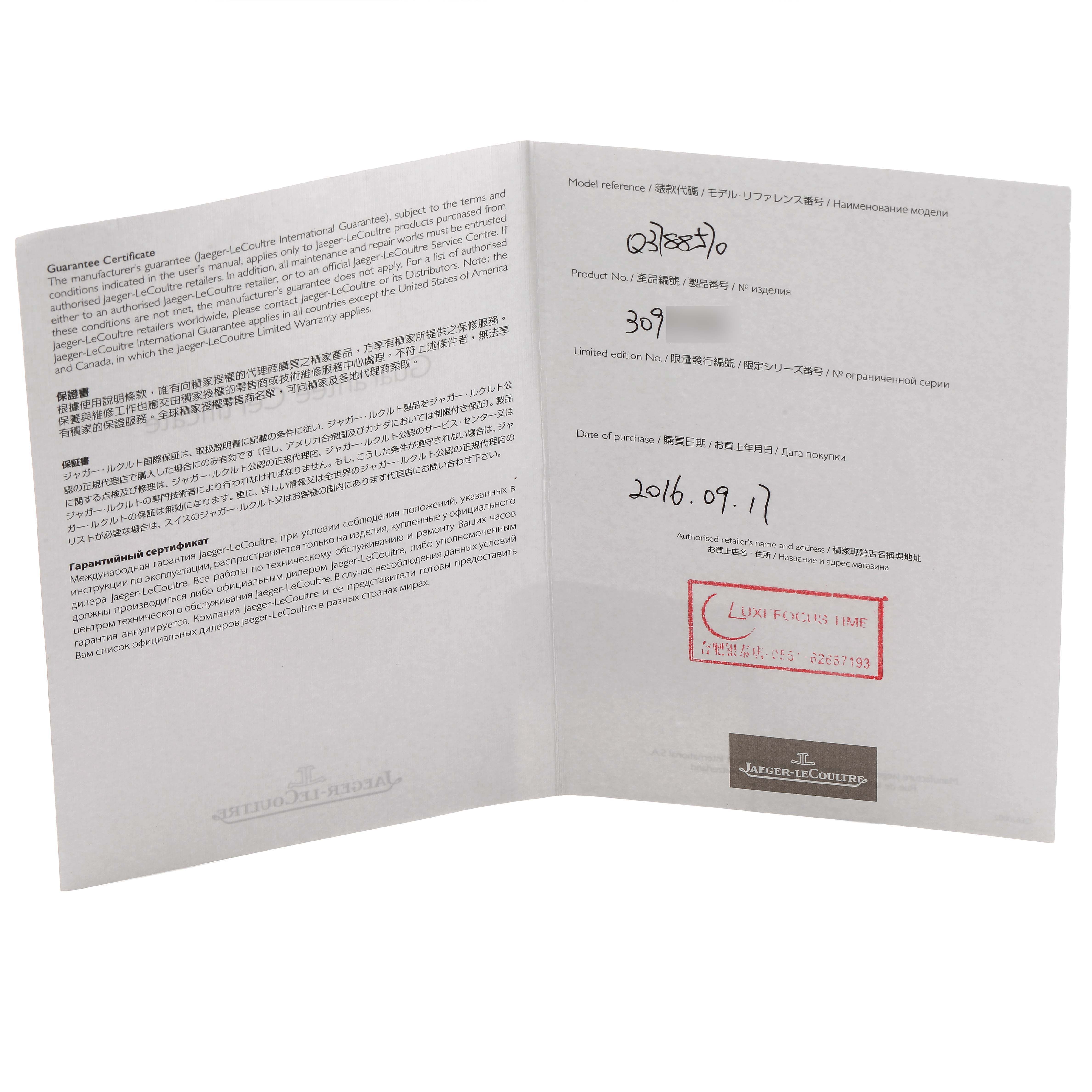 The Jaeger-LeCoultre Reverso model warranty card is shown open, displaying written details and a stamp on one page.