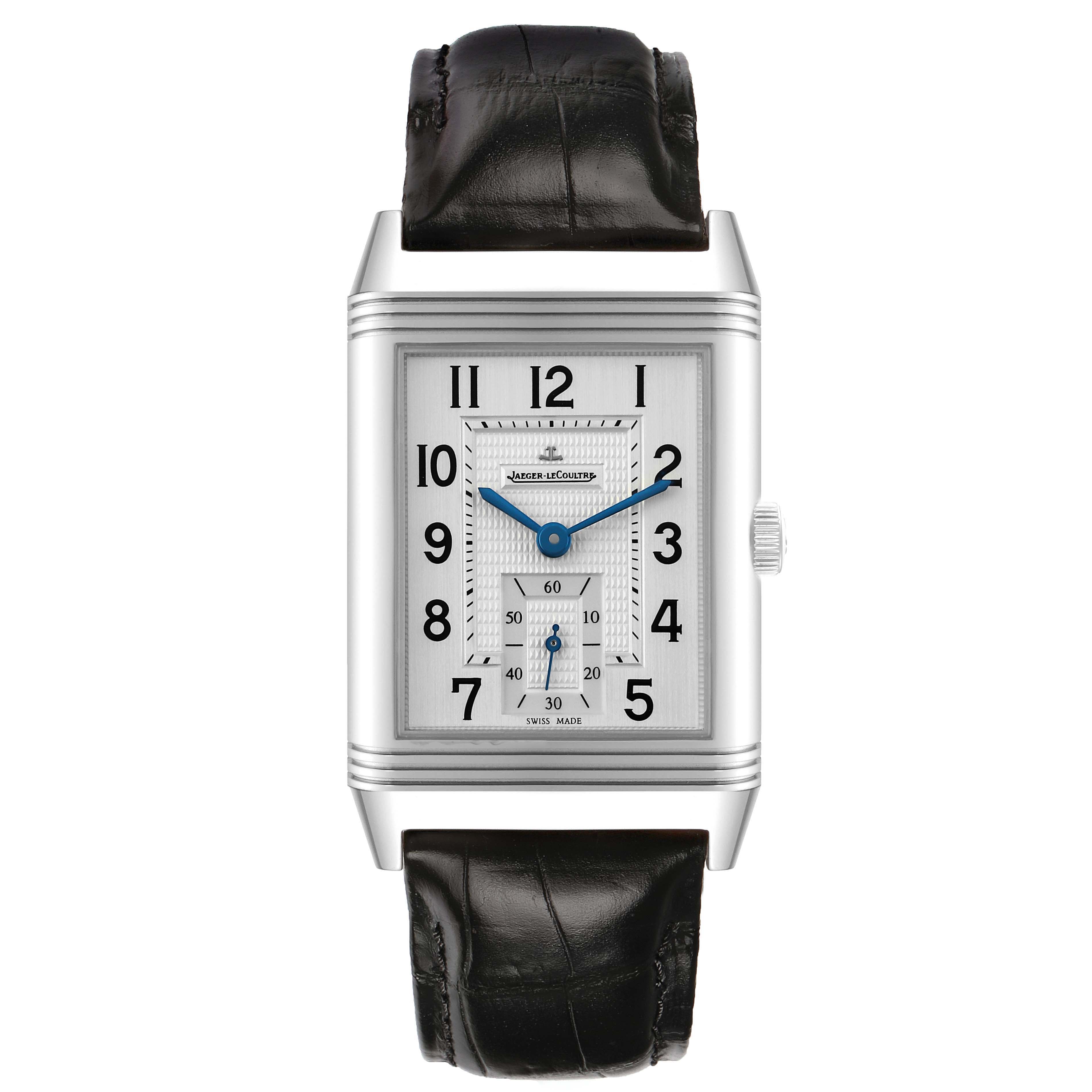 The Jaeger-LeCoultre Reverso watch is shown front-facing, highlighting its dial, case, and black leather strap.