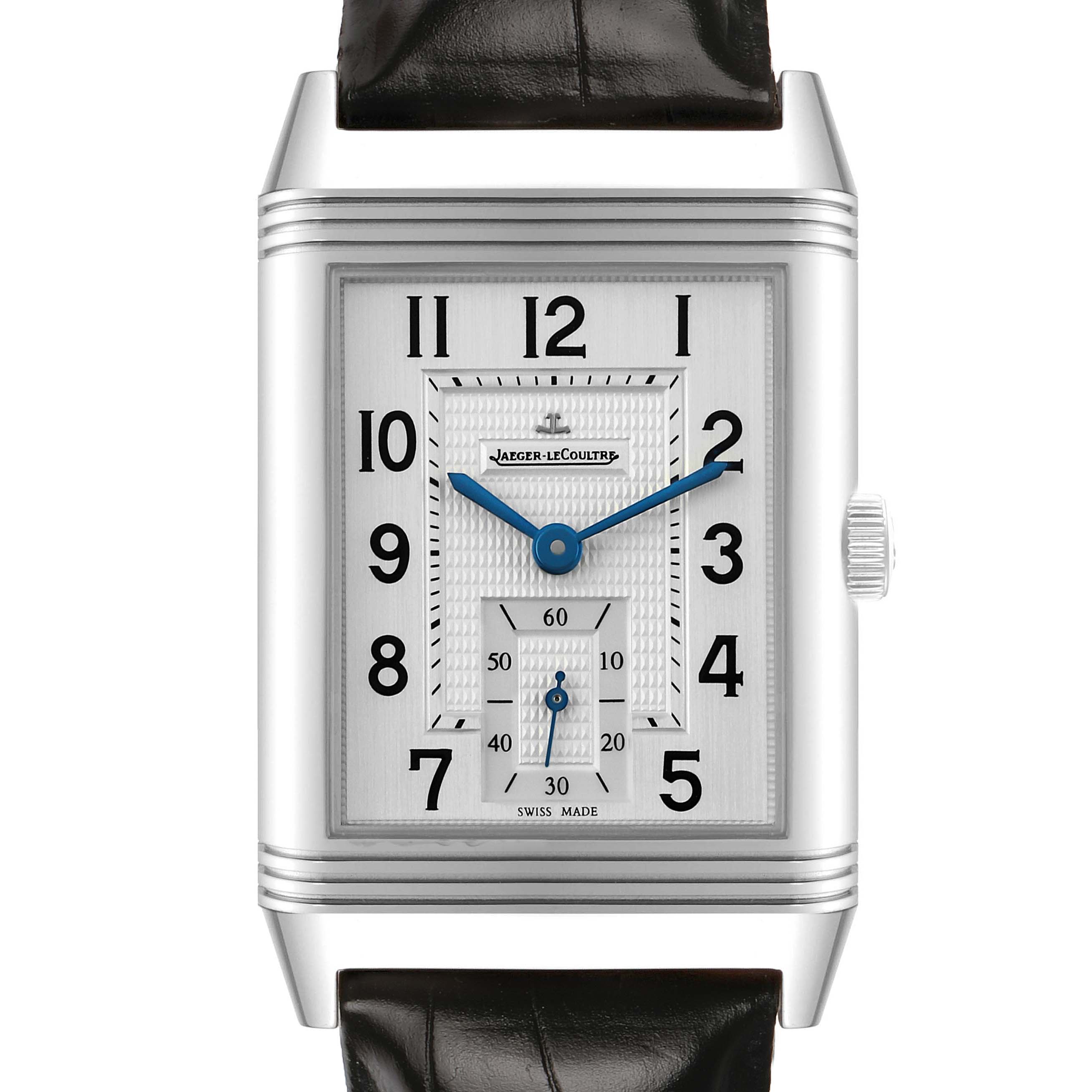 The Jaeger-LeCoultre Reverso watch is shown from a frontal angle, featuring its rectangular case, watch face, dial, and crown.