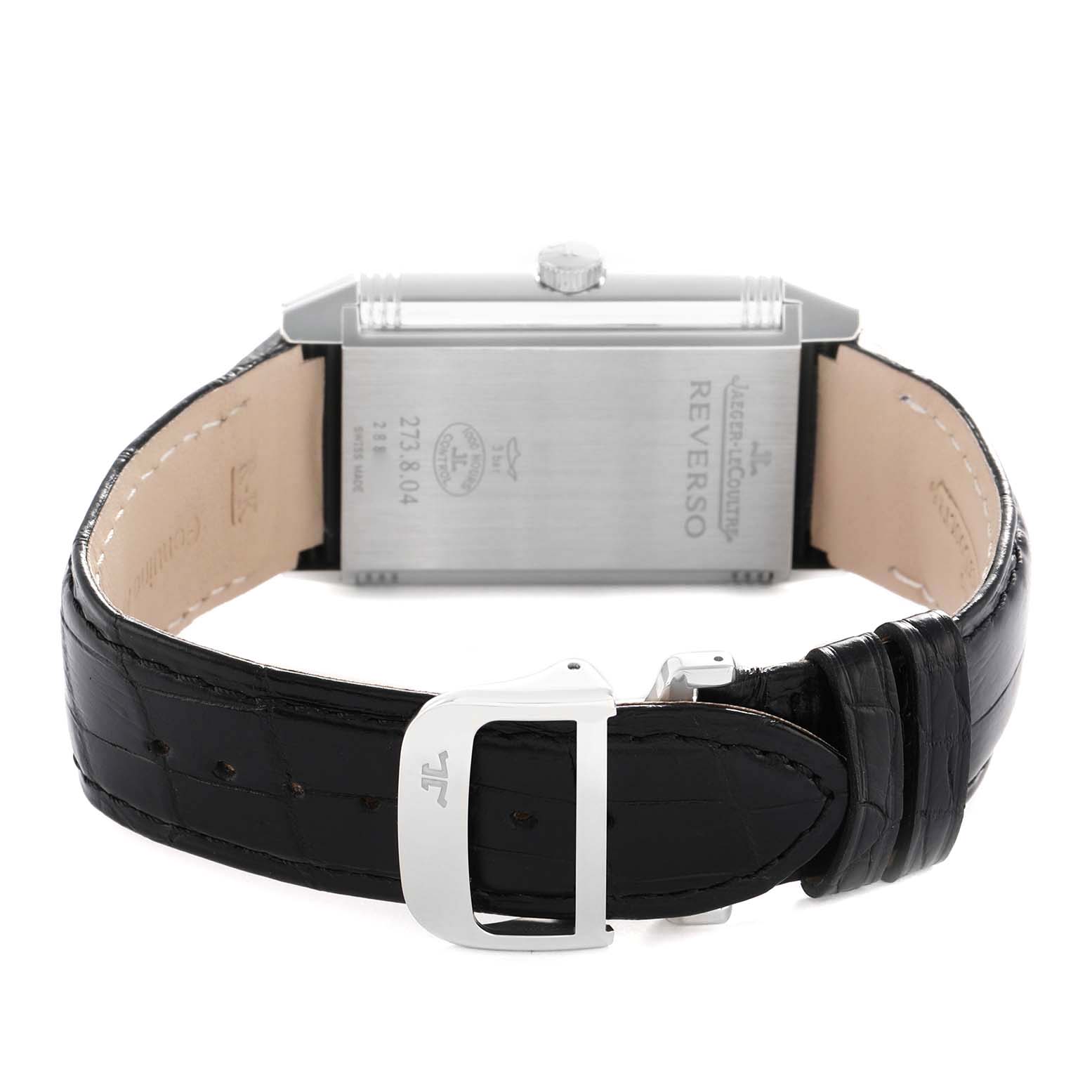 The image shows the back of a Jaeger LeCoultre Reverso Q3738420 Men's Stainless Steel Silver Dial, highlighting the watch's case back, crown, and leather strap with buckle.