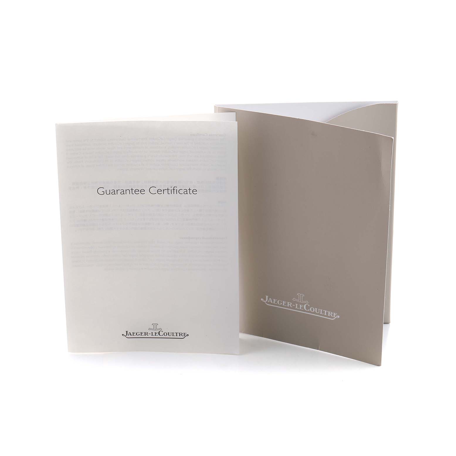 The image shows the Jaeger LeCoultre Reverso Q3738420 Men's Stainless Steel Silver Dial watch accessories, specifically the guarantee certificate and documentation folder.