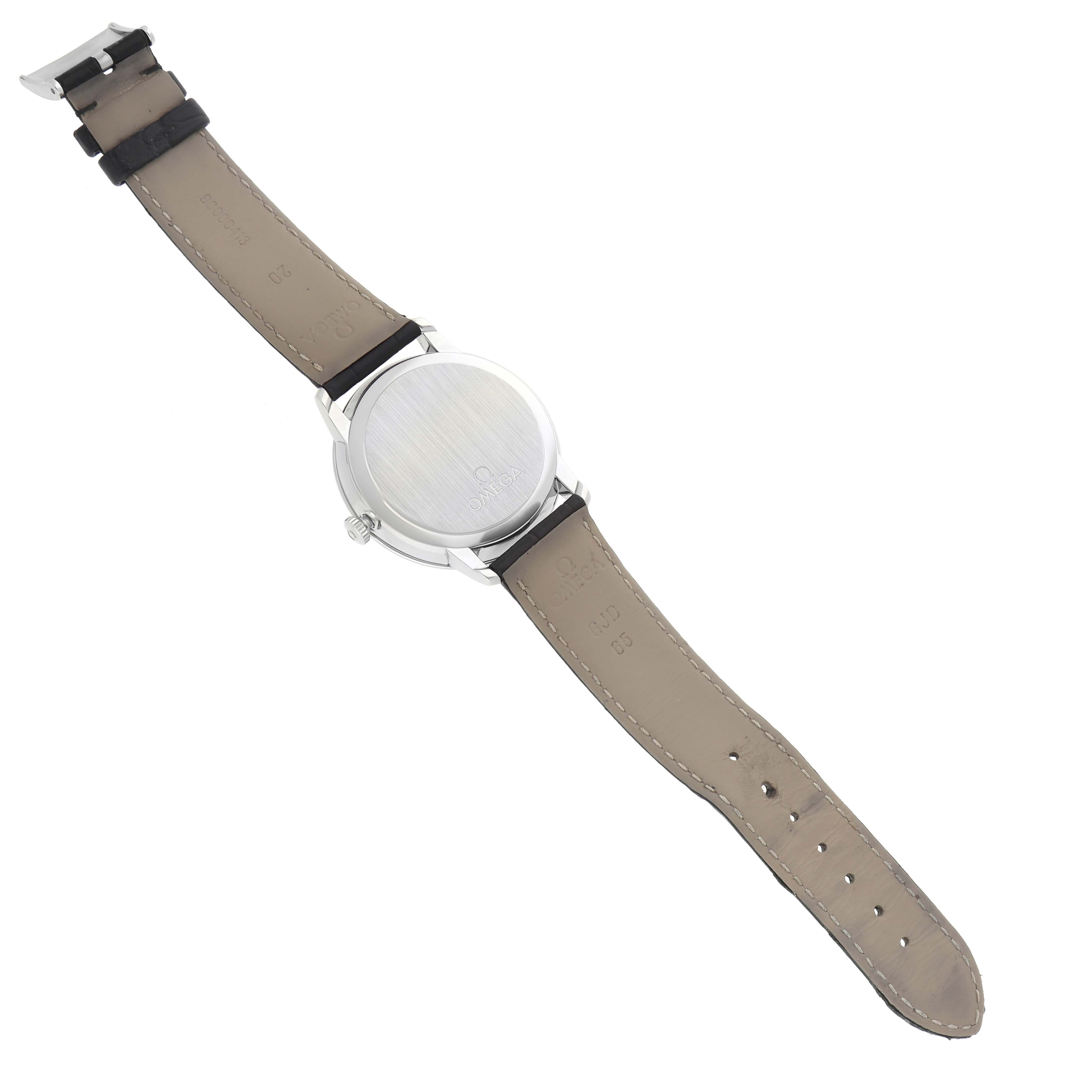 The Omega De Ville 424.13.40.20.01.001 Men's Stainless Steel Black Dial watch is shown from the back, highlighting the case back and leather strap.