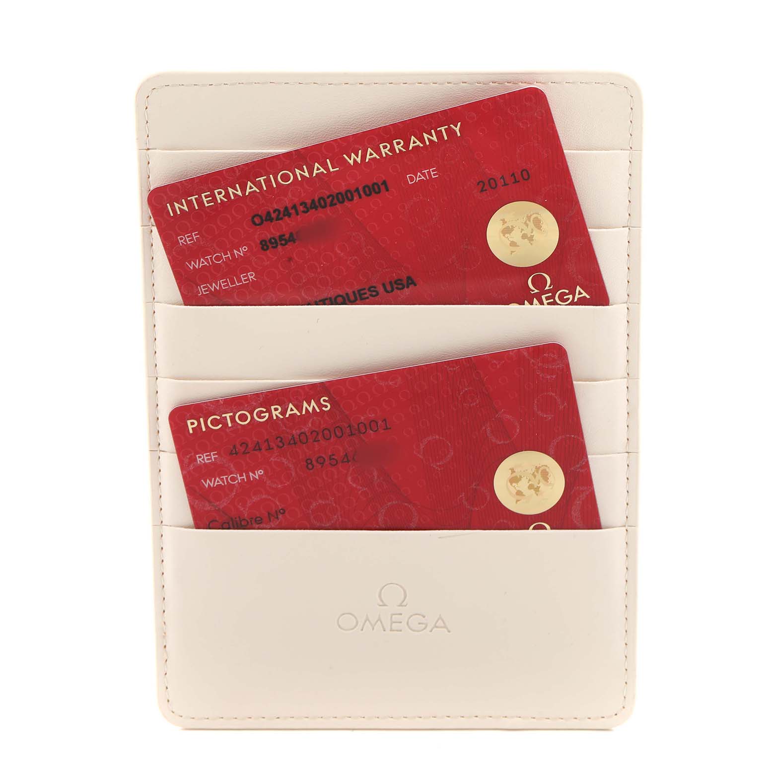 The image shows International Warranty and Pictograms cards in a leather holder for the Omega De Ville 424.13.40.20.01.001 Men's Stainless Steel Black Dial watch.