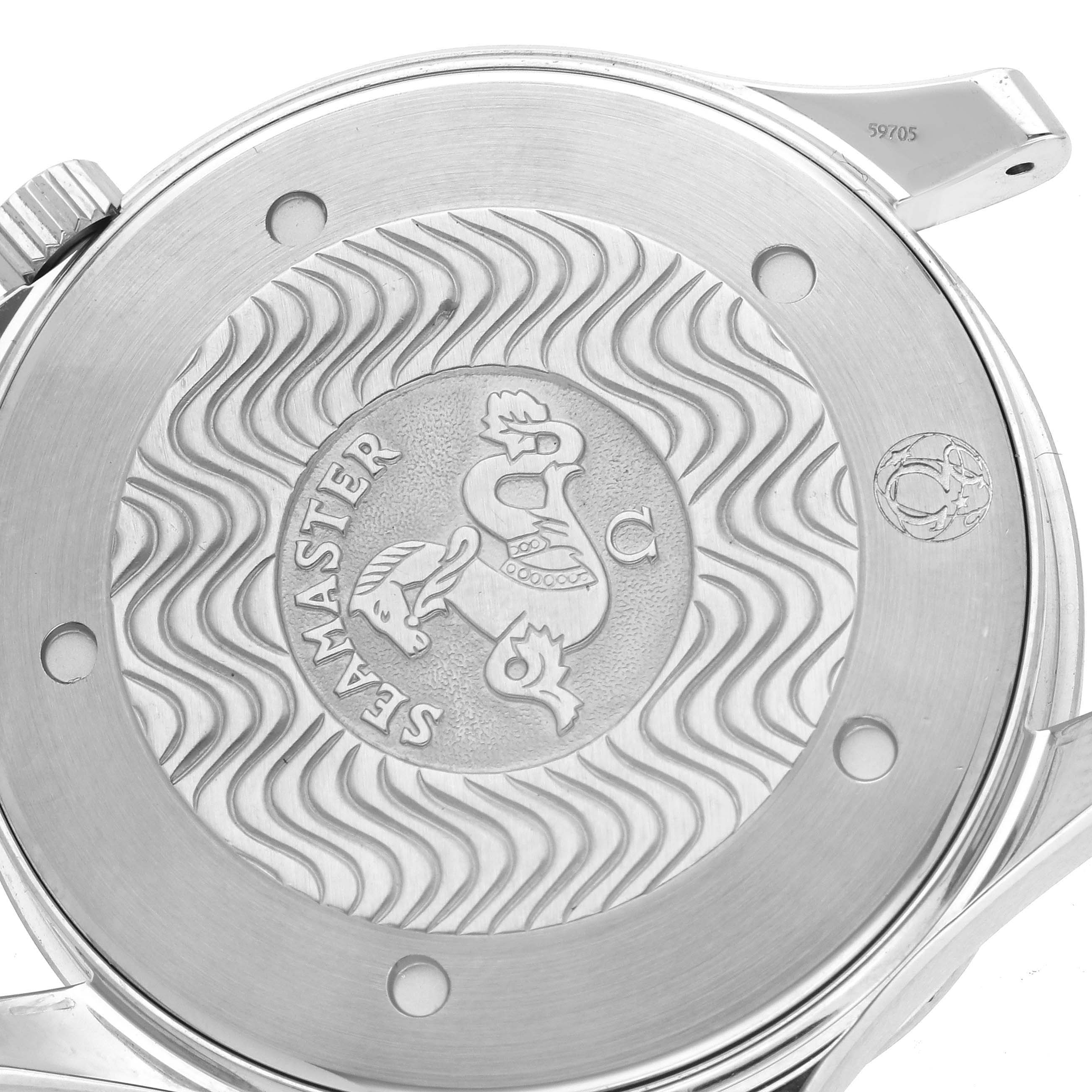 The image shows the back case of an Omega Seamaster 2541.80.00 Men's Stainless Steel Blue Dial 2541.80.00 Men's Stainless Steel Blue Dial watch with engraved details and wave patterns.