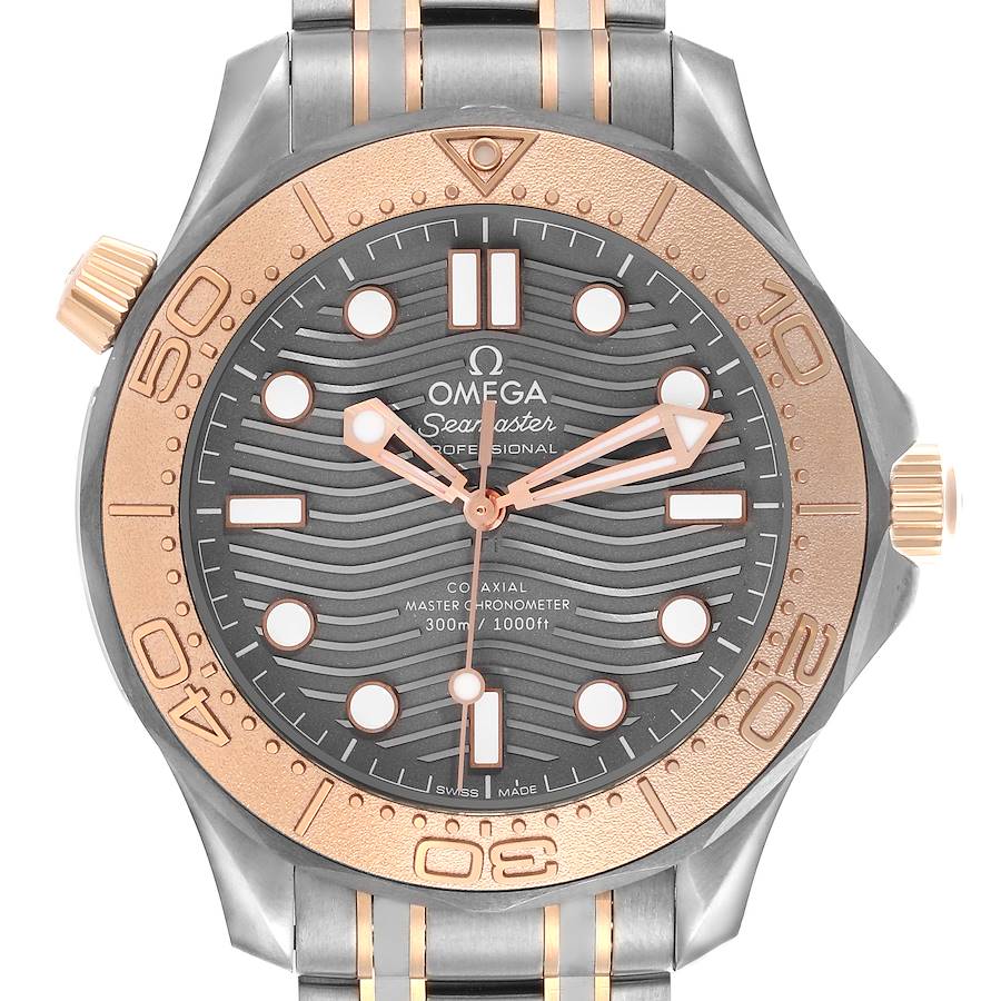 The Omega Seamaster watch is shown from the front, highlighting the bezel, dial, hands, and part of the bracelet.