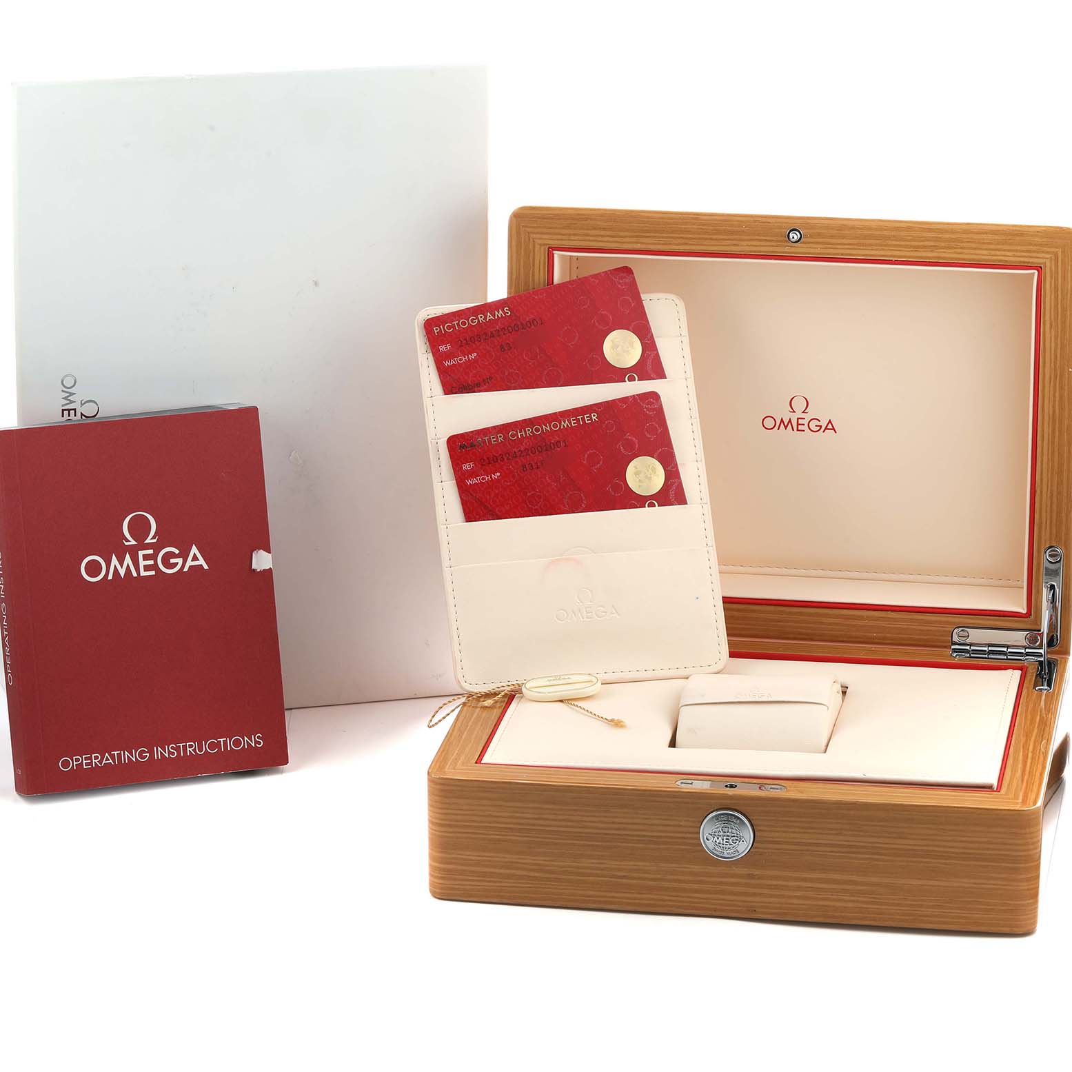 The Omega Seamaster 210.32.42.20.01.001 Men's Stainless Steel Black Dial package includes the wooden watch box, operating instructions, warranty cards, and an outer box.