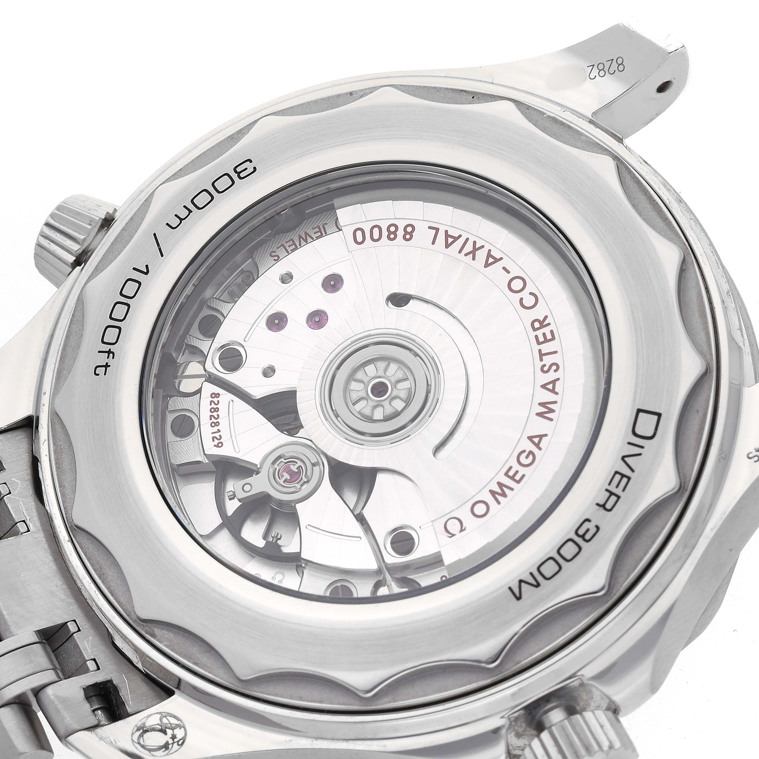 The image shows the case back of the Omega Seamaster 210.30.42.20.06.001 Men's Stainless Steel Grey Dial, highlighting the Co-Axial movement and water resistance markings.