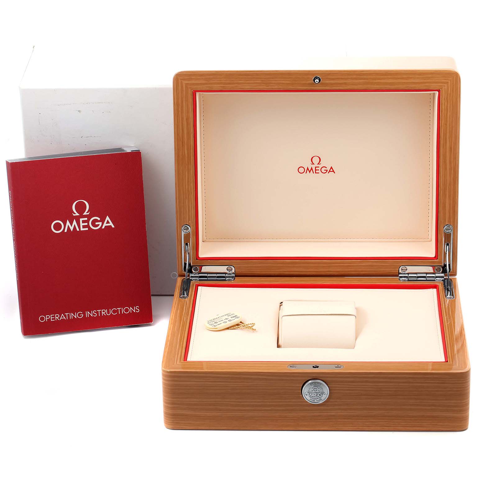 The image shows an open Omega Planet Ocean 232.30.44.22.03.001 Men
s Stainless Steel Blue Dial 232.30.44.22.03.001 Men
s Stainless Steel Blue Dial watch box and operating instructions booklet.