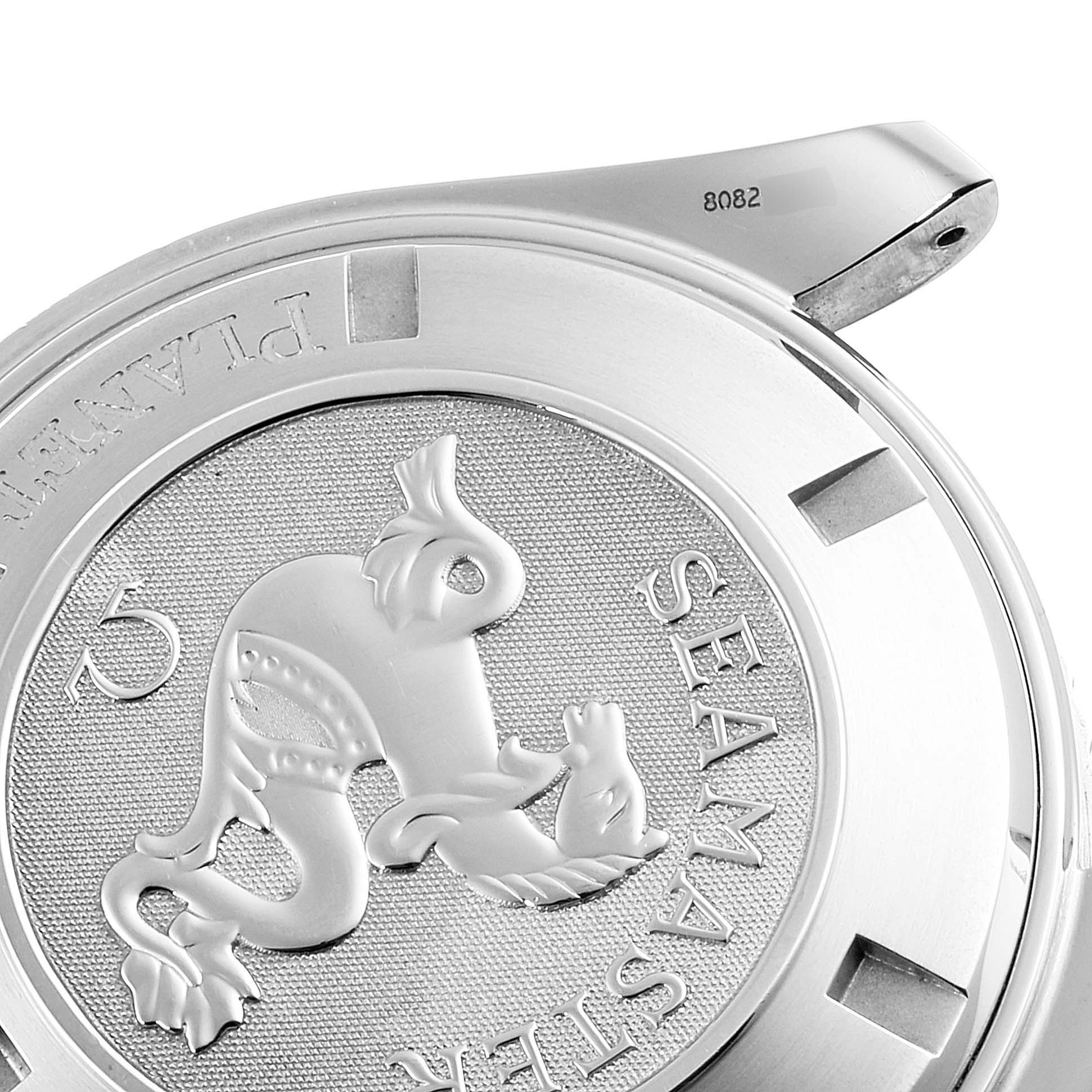 The image shows the case back of the Omega Planet Ocean 2200.50.00 Men
s Stainless Steel Black Dial 2200.50.00 Men
s Stainless Steel Black Dial watch, highlighting the Seahorse engraving and some text.