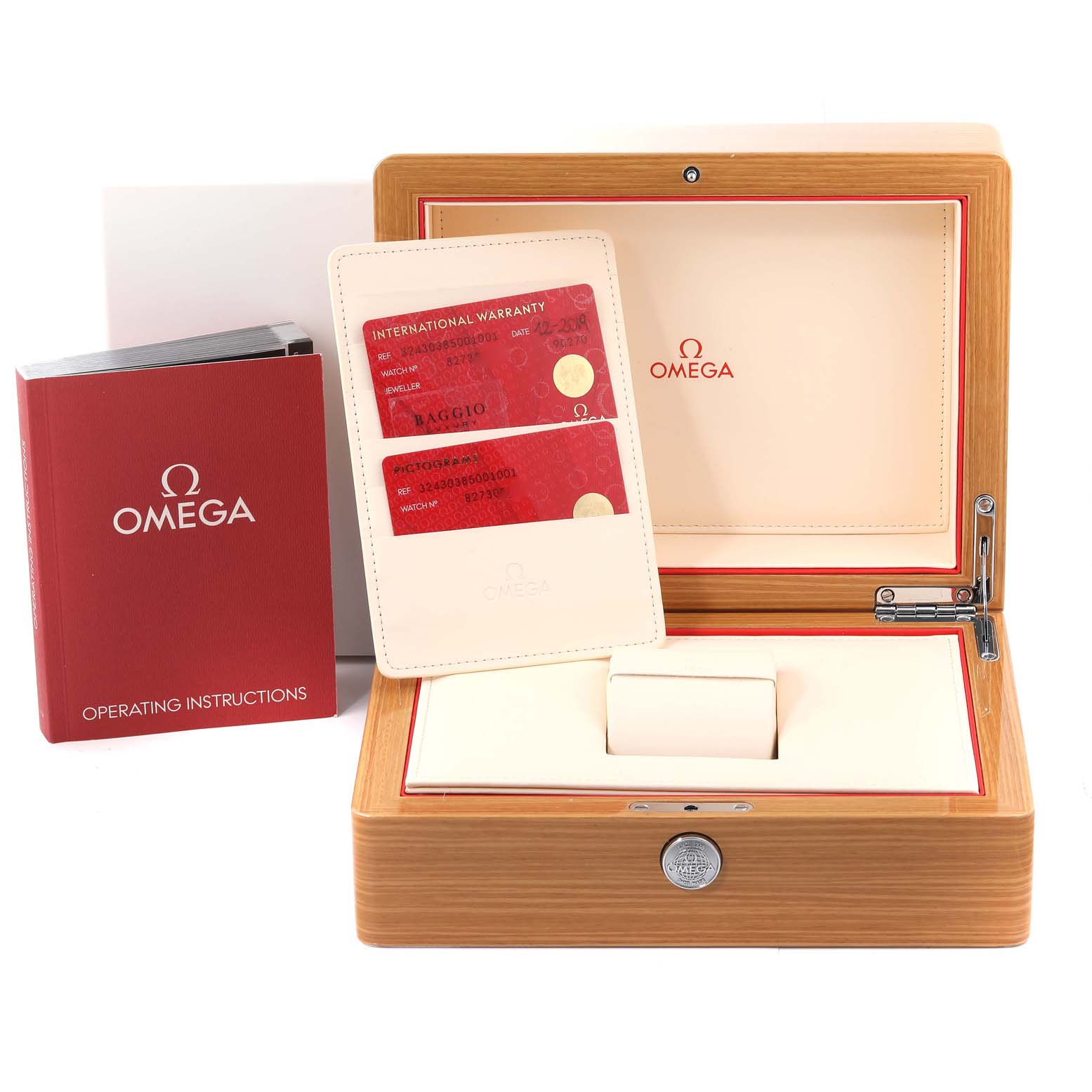The image shows the packaging of an Omega Speedmaster 324.30.38.50.01.001 Men's Stainless Steel Black Dial 324.30.38.50.01.001 Men's Stainless Steel Black Dial, including the watch box, operating instructions, and warranty cards.