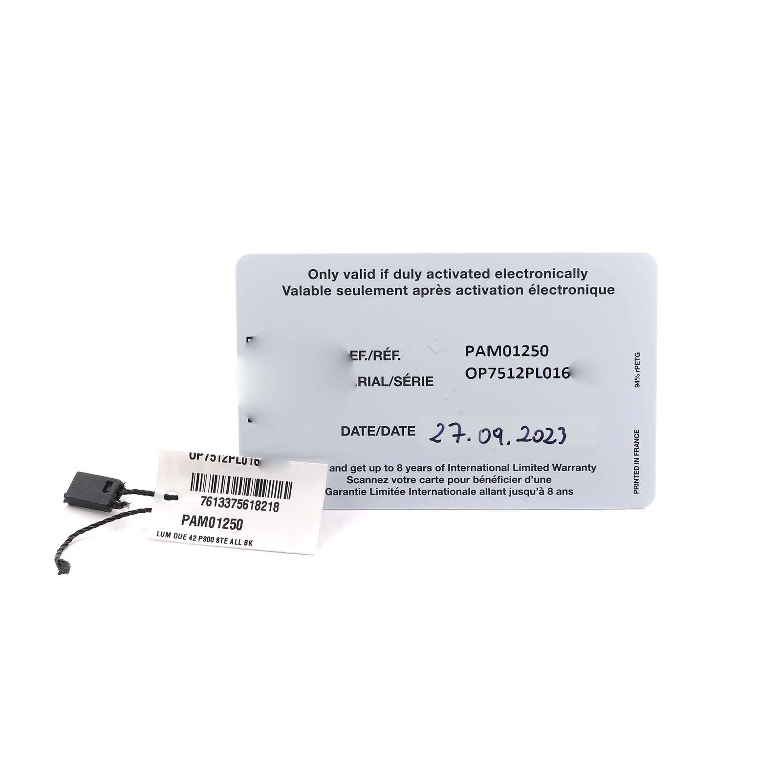 The image shows warranty cards and a tag for the Panerai Luminor PAM01250 Men's Stainless Steel Grey Dial PAM01250 model.