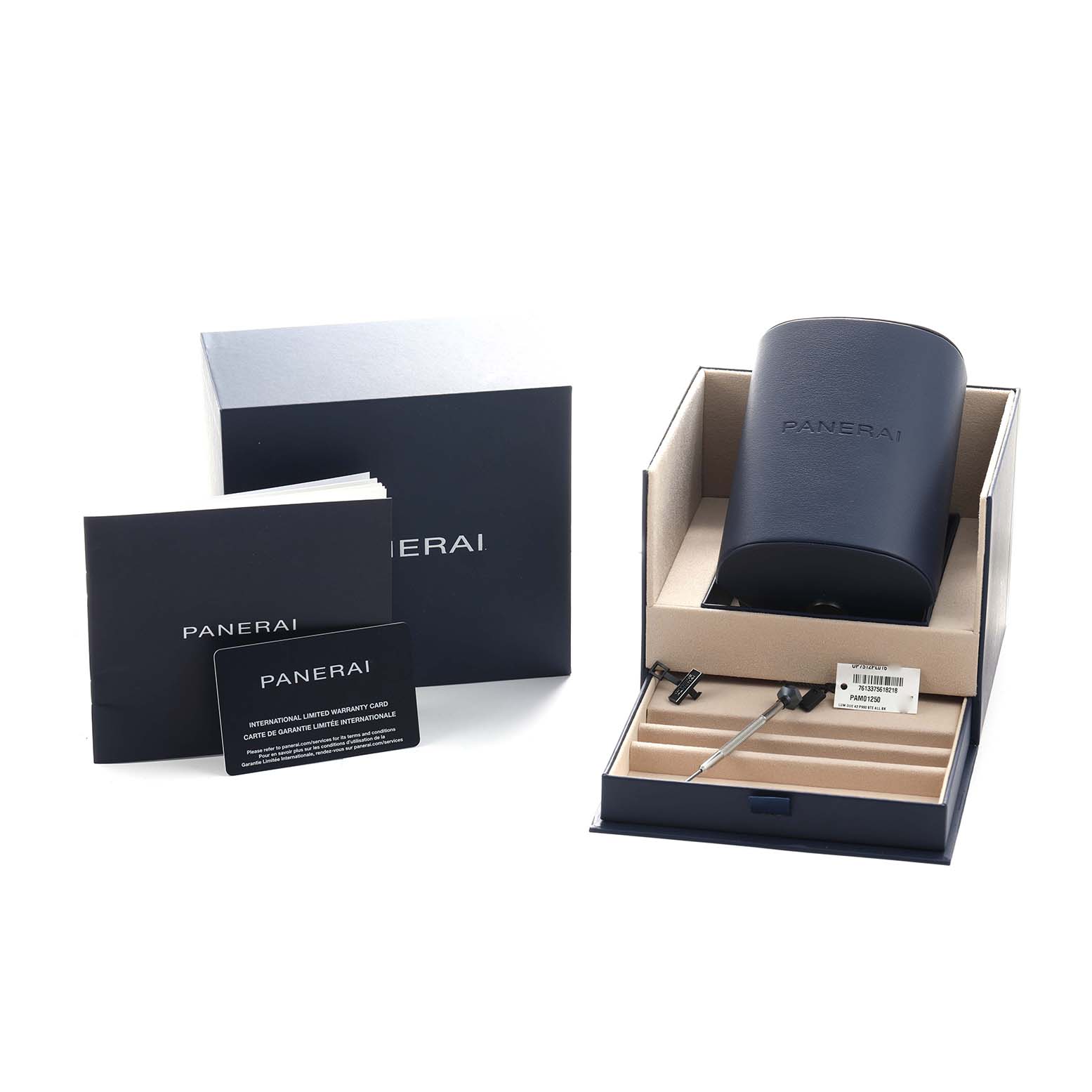 The image shows a Panerai Luminor PAM01250 Men's Stainless Steel Grey Dial packaging with a watch box, booklet, warranty card, and accessories in an open display.