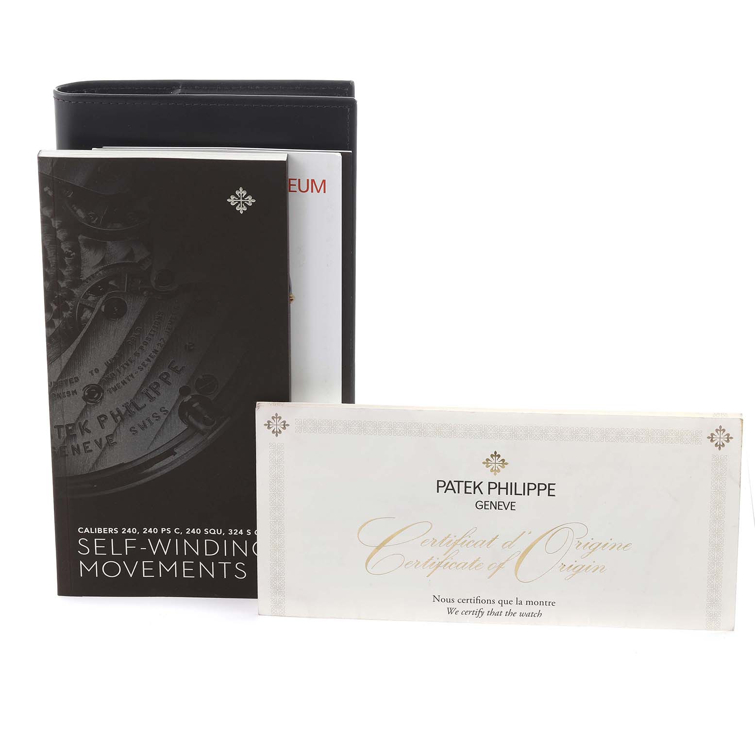 The image shows a Patek Philippe Calatrava 5297G-001 Men's White Gold Black Dial 5297G-001 Men's White Gold Black Dial booklet and certificate at a slight angle.