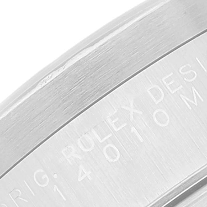 The image shows a close-up of the Rolex Air-King 14010 Men's Stainless Steel Blue Dial 14010 Men's Stainless Steel Blue Dial watch case with engraved text.