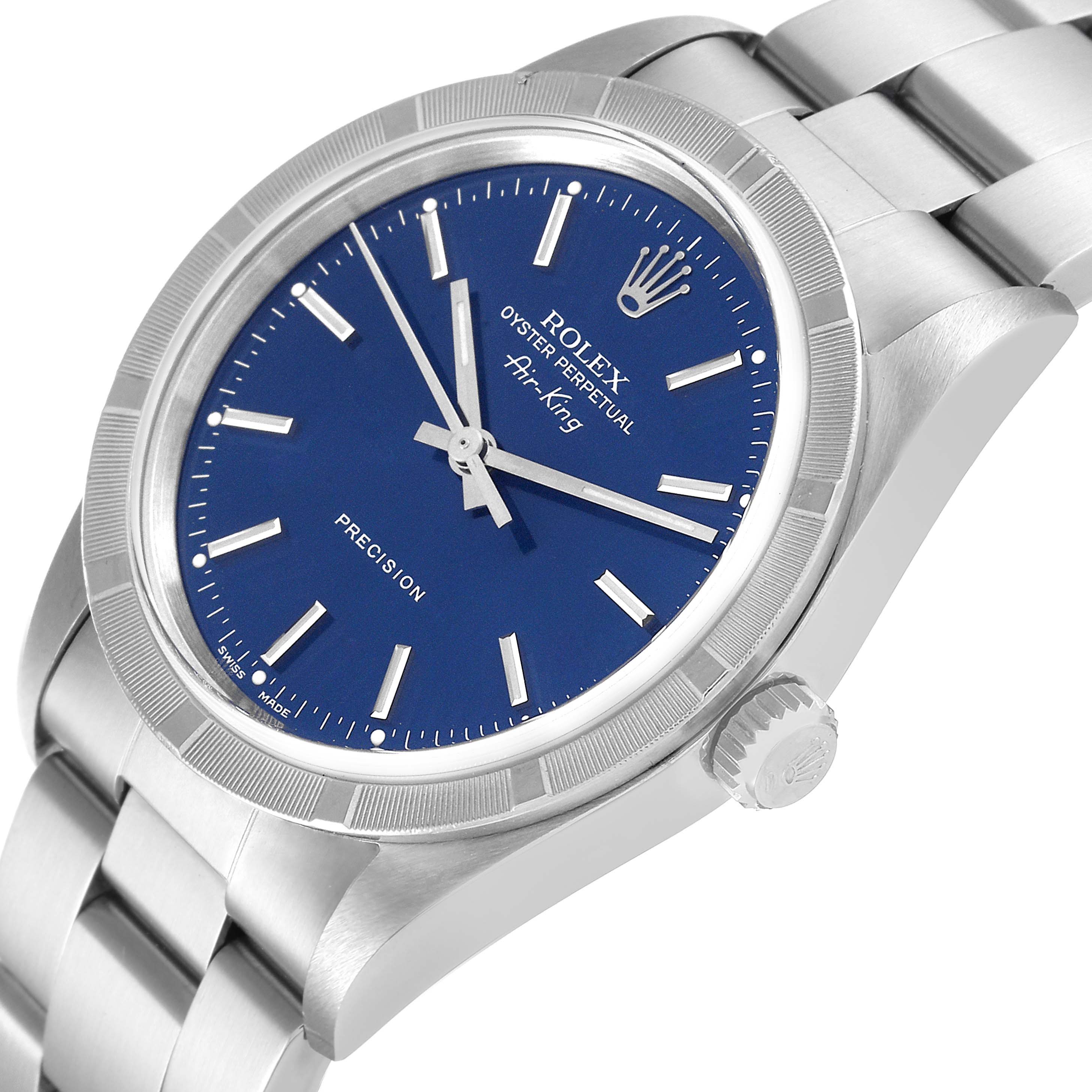 The image shows a side angle of the Rolex Air-King 14010 Men's Stainless Steel Blue Dial 14010 Men's Stainless Steel Blue Dial watch, displaying the blue dial, crown, bezel, and part of the stainless steel bracelet.