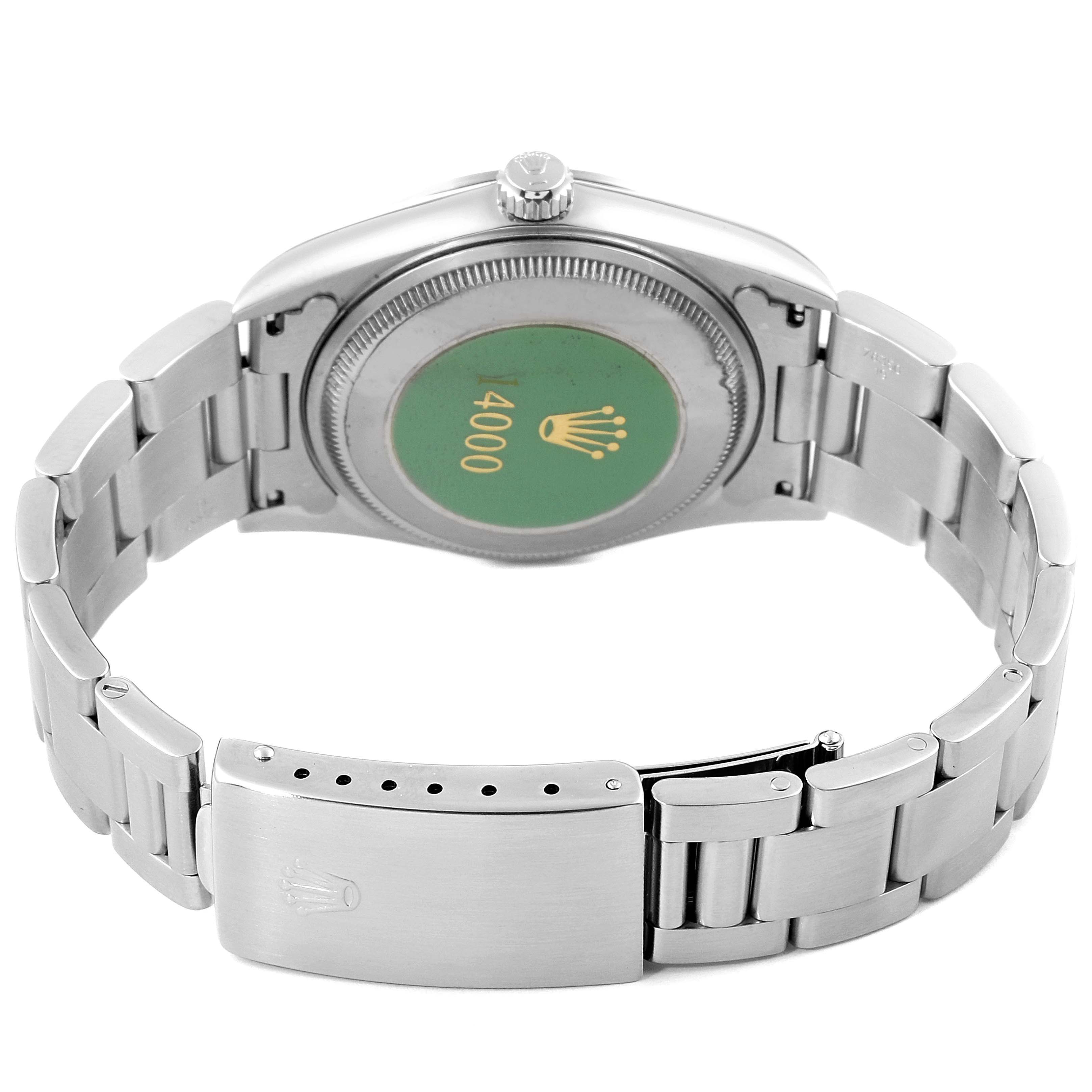 This image shows the back casing and bracelet clasp of a Rolex Air-King 14000 Men's Stainless Steel White Dial 14000 Men's Stainless Steel White Dial watch from a rear angle.