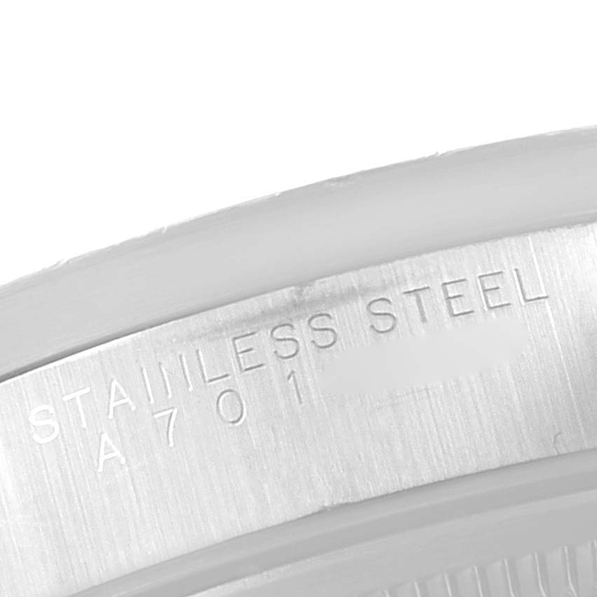 This image shows a close-up of the back casing of a Rolex Air-King 14010 Men's Stainless Steel Silver Dial 14010 Men's Stainless Steel Silver Dial watch, highlighting the stainless steel engraving.