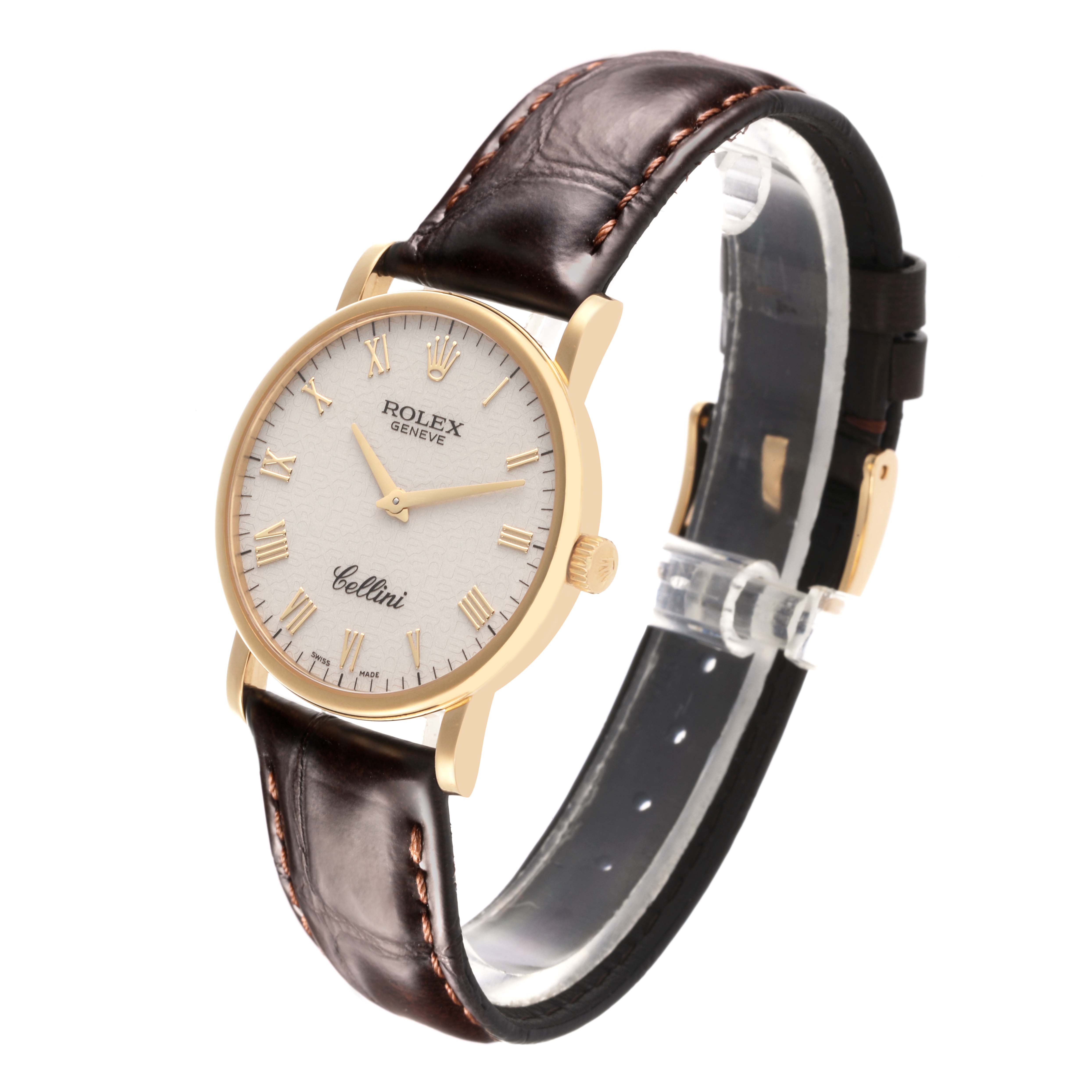 The Rolex Cellini 5115/8 Men's Yellow Gold White Dial 5115/8 Men's Yellow Gold White Dial watch is shown at a slight angle, highlighting the face, gold case, and brown leather strap.