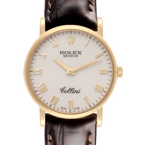 The image shows a frontal view of the Rolex Cellini watch, highlighting the dial, hands, and leather strap.