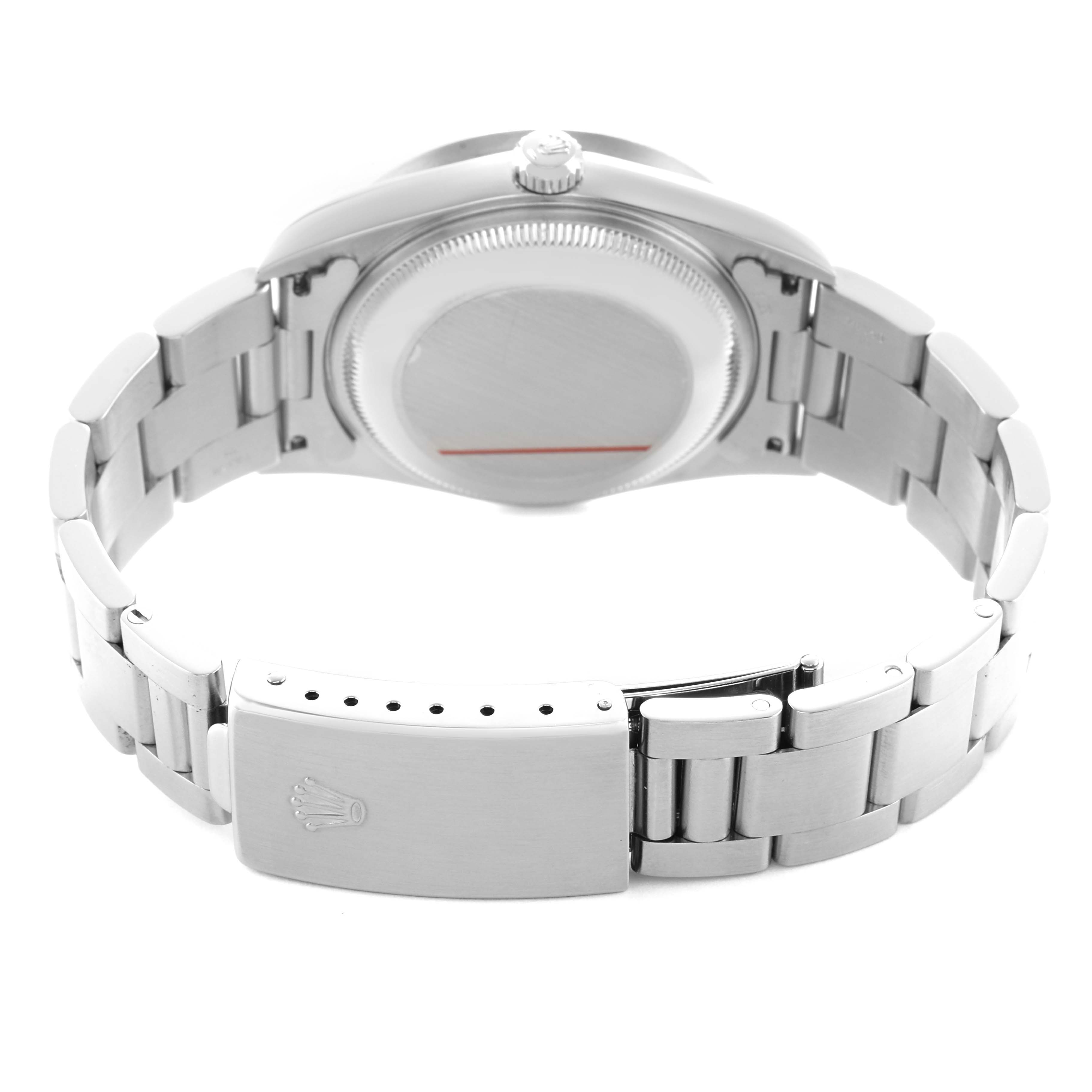 The image shows the back view of a Rolex Date 15210 Men's Stainless Steel Blue Dial model, highlighting the case, bracelet, and clasp.