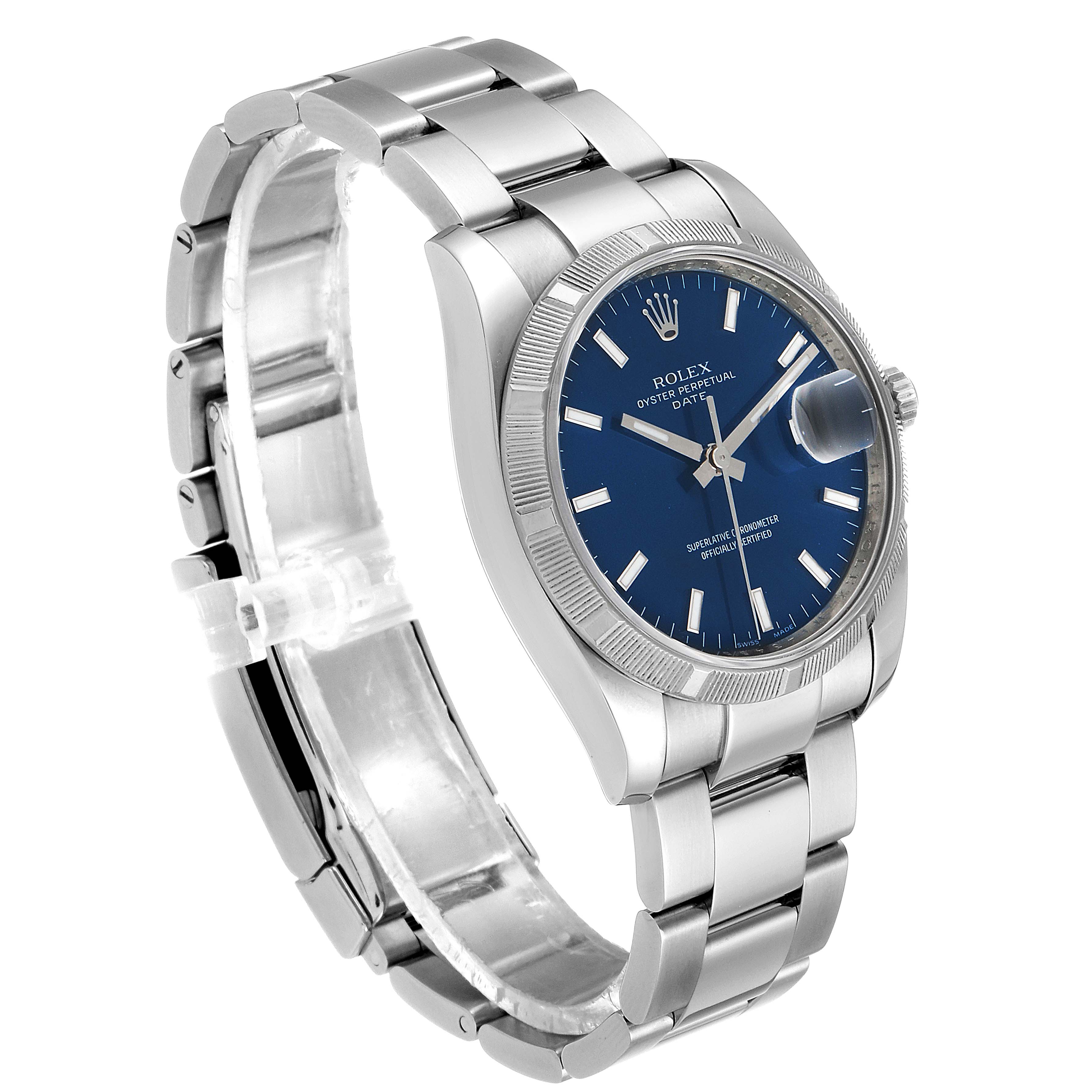 The Rolex Date 115210 Men's Stainless Steel Blue Dial 115210 Men's Stainless Steel Blue Dial model watch is shown at a three-quarter angle, displaying its blue dial, bezel, and metal bracelet.