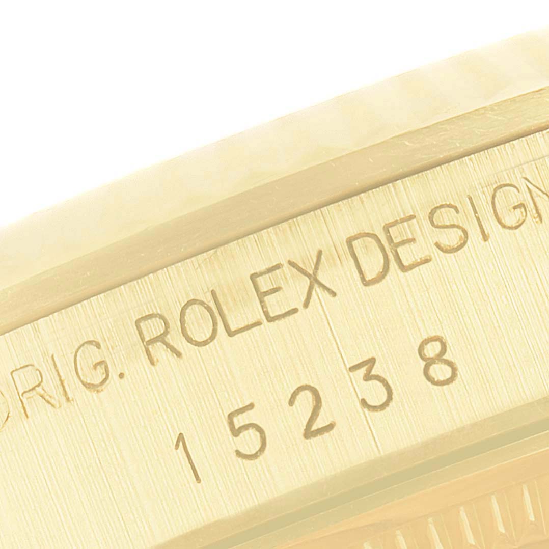 This close-up image shows the serial number engravings on the side of the case of a Rolex President 15238 Men
s Yellow Gold Champagne Dial 15238 Men
s Yellow Gold Champagne Dial model.