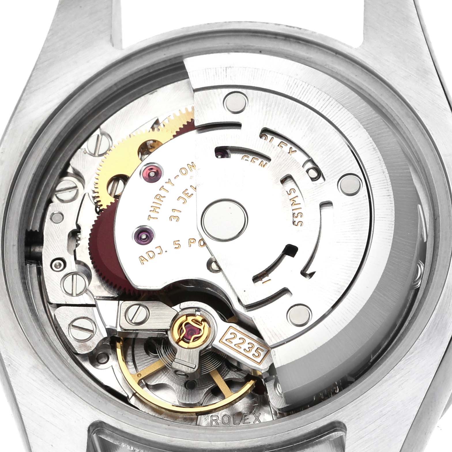 The image shows the movement and internal mechanics of a Rolex Datejust 179384 Women's Stainless Steel Black Dial 179384 Women's Stainless Steel Black Dial watch from a close-up, rear angle.