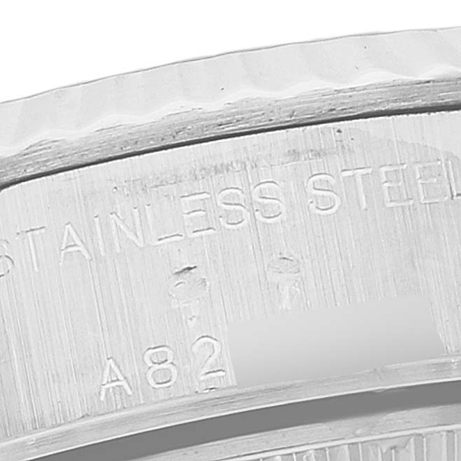 The image shows a close-up of the stainless steel case, specifically the inside part, of a Rolex Datejust 79174 Women's Stainless Steel Black Dial 79174 Women's Stainless Steel Black Dial watch.