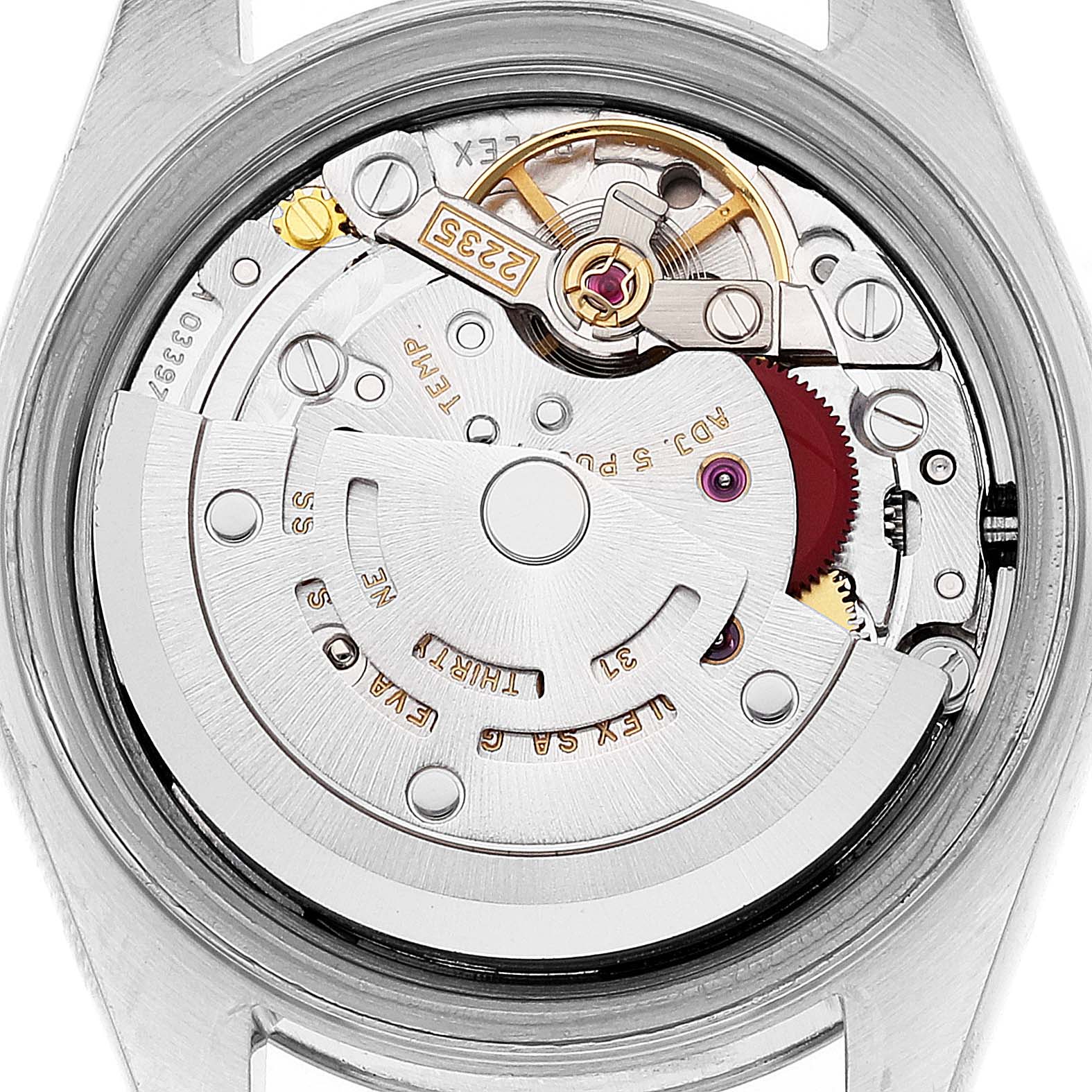 This is an internal view of the Rolex Datejust 79174 Women's Stainless Steel Black Dial 79174 Women's Stainless Steel Black Dial watch, showcasing its intricate movement and mechanism.