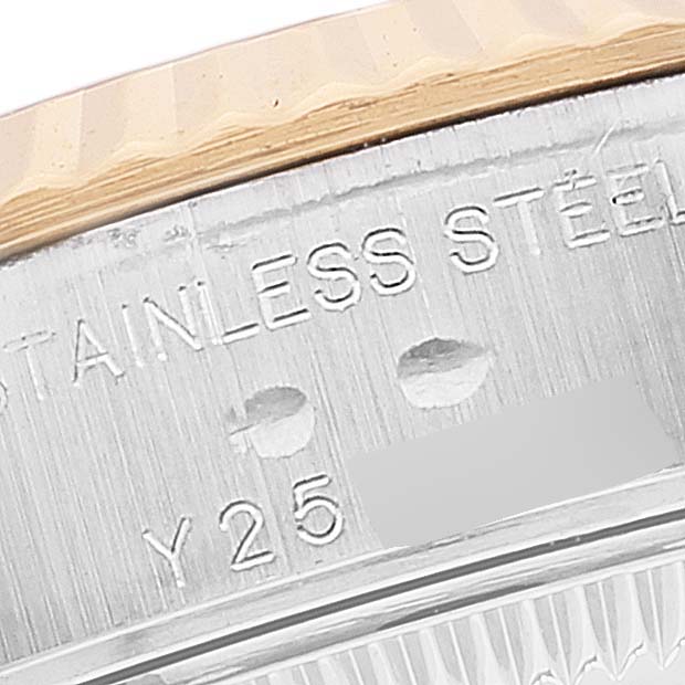 This image shows a close-up of the side of a Rolex Datejust 79173 Women's Steel and Gold (two tone) White Dial 79173 Women's Steel and Gold (two tone) White Dial watch, highlighting the stainless steel and partial serial number.