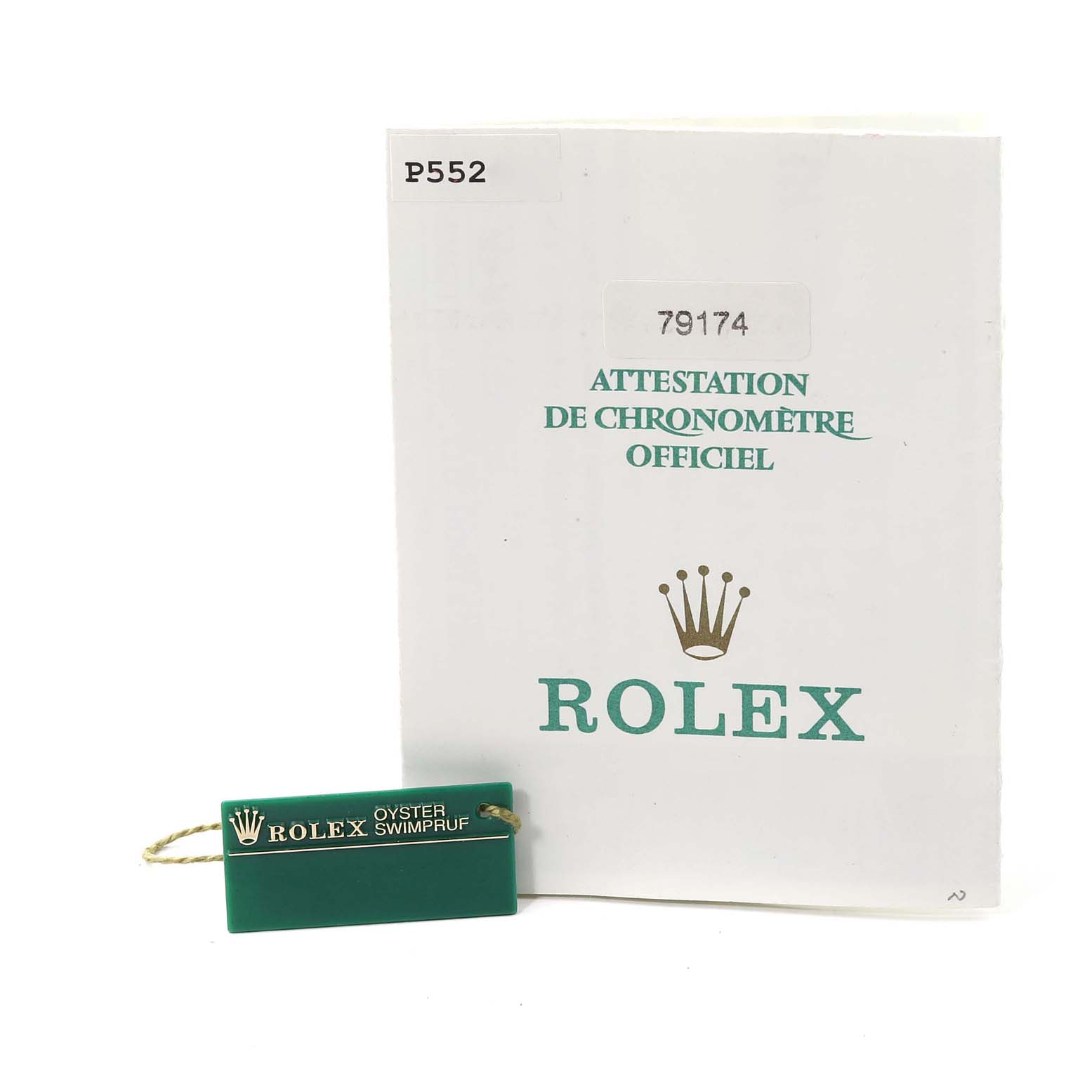 The image shows a Rolex Datejust 79174 Women's Stainless Steel Silver Dial 79174 Women's Stainless Steel Silver Dial model certificate and a green Rolex Oyster Swimpruf hang tag.