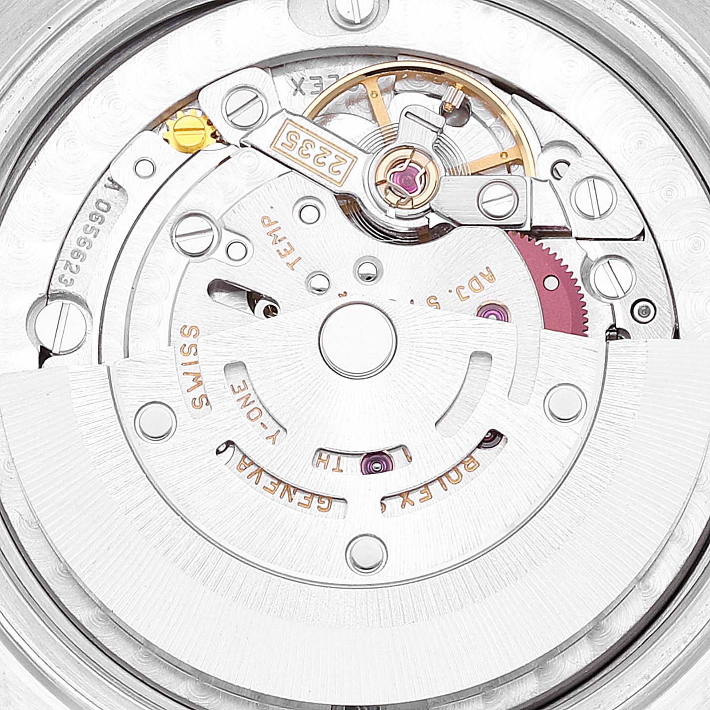 This image shows the intricate internal mechanism of a Rolex Mid-Size 78240 Women
s Stainless Steel Black Dial 78240 Women
s Stainless Steel Black Dial model watch, including gears and the rotor, viewed from the back.