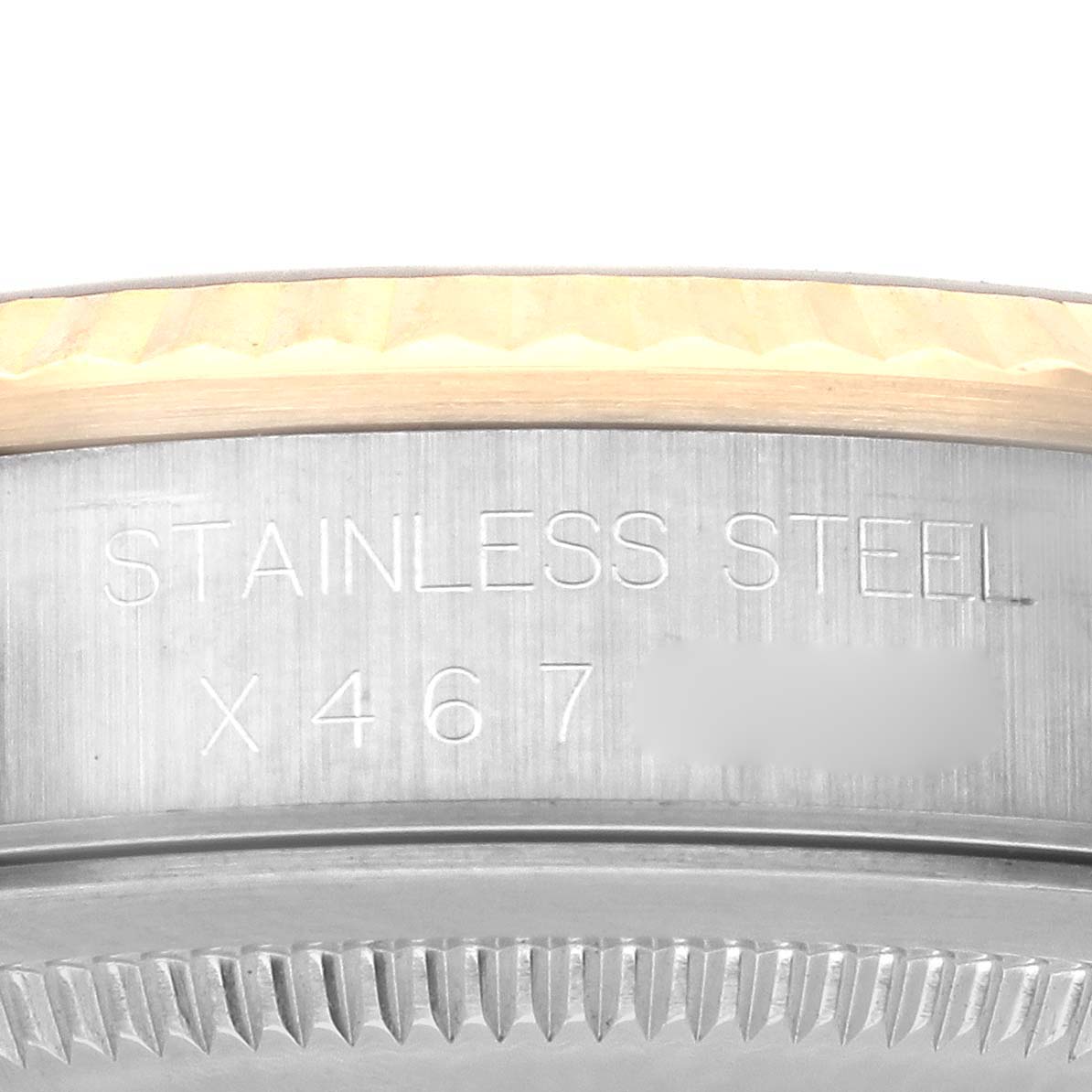 The image shows a close-up of the side edge of a Rolex Datejust 16233 Men's Steel and Gold (two tone) Black Dial 16233 Men's Steel and Gold (two tone) Black Dial, focusing on the stainless steel case and part of the bezel.