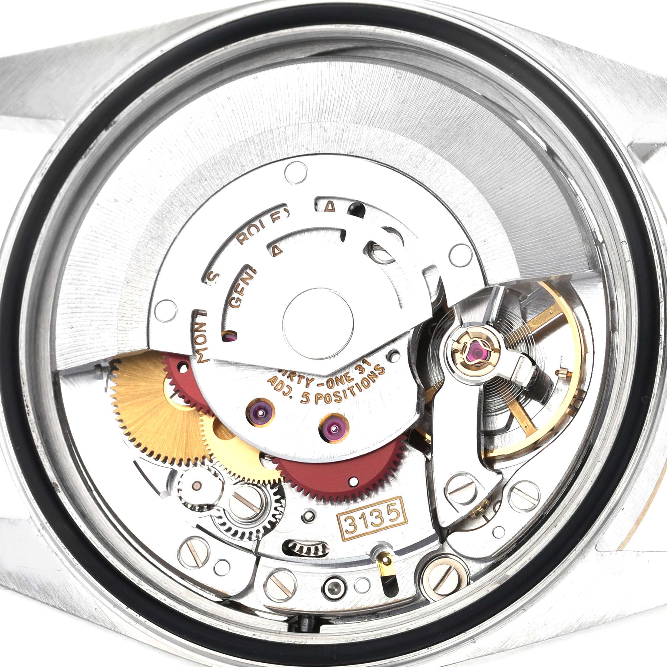 The image shows the internal mechanical movement components of a Rolex Datejust 16233 Men's Steel and Gold (two tone) Champagne Dial 16233 Men's Steel and Gold (two tone) Champagne Dial.