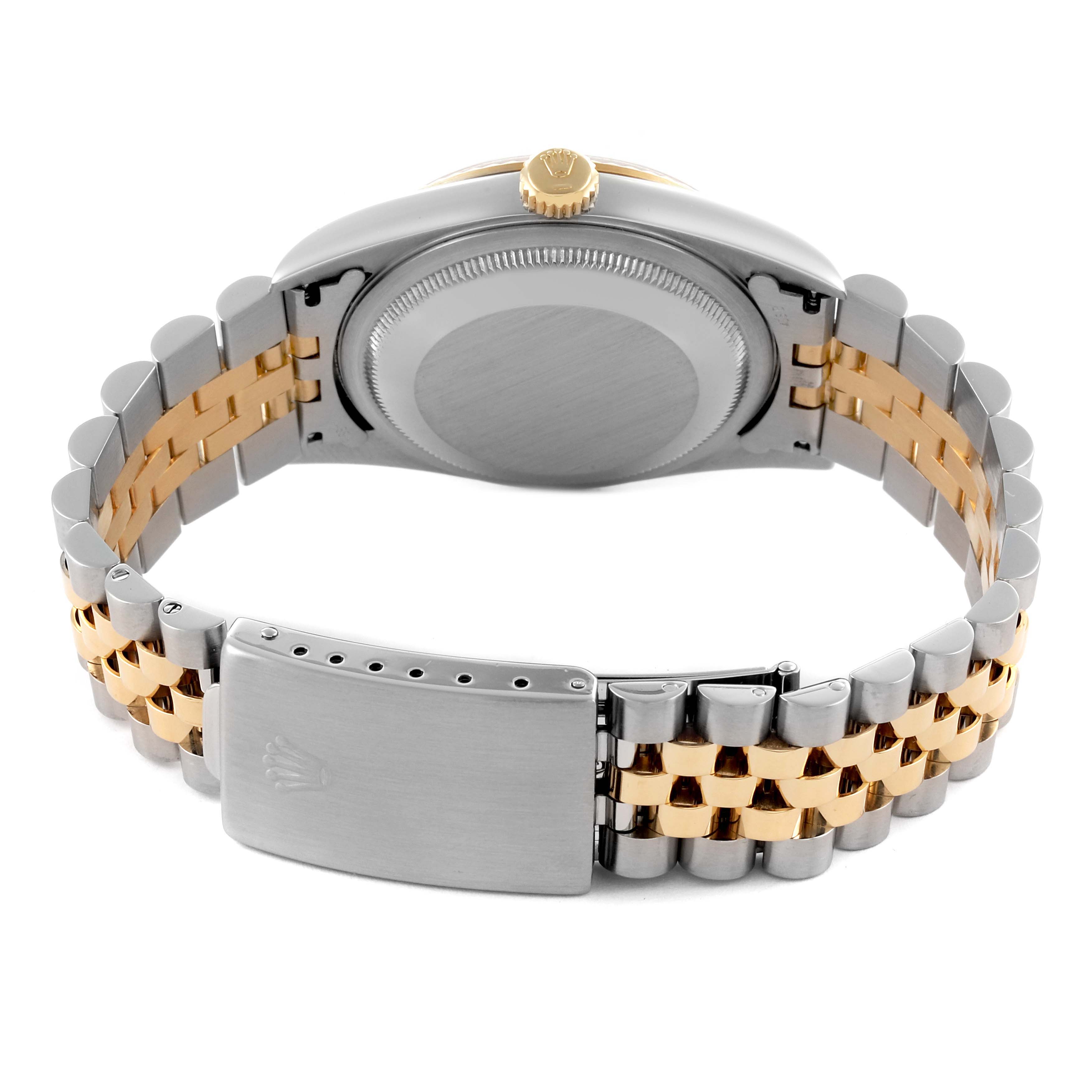 The Rolex Datejust 16233 Men
s Steel and Gold (two tone) Silver Dial 16233 Men
s Steel and Gold (two tone) Silver Dial is shown from the back, highlighting the case back, crown, and two-tone Jubilee bracelet.
