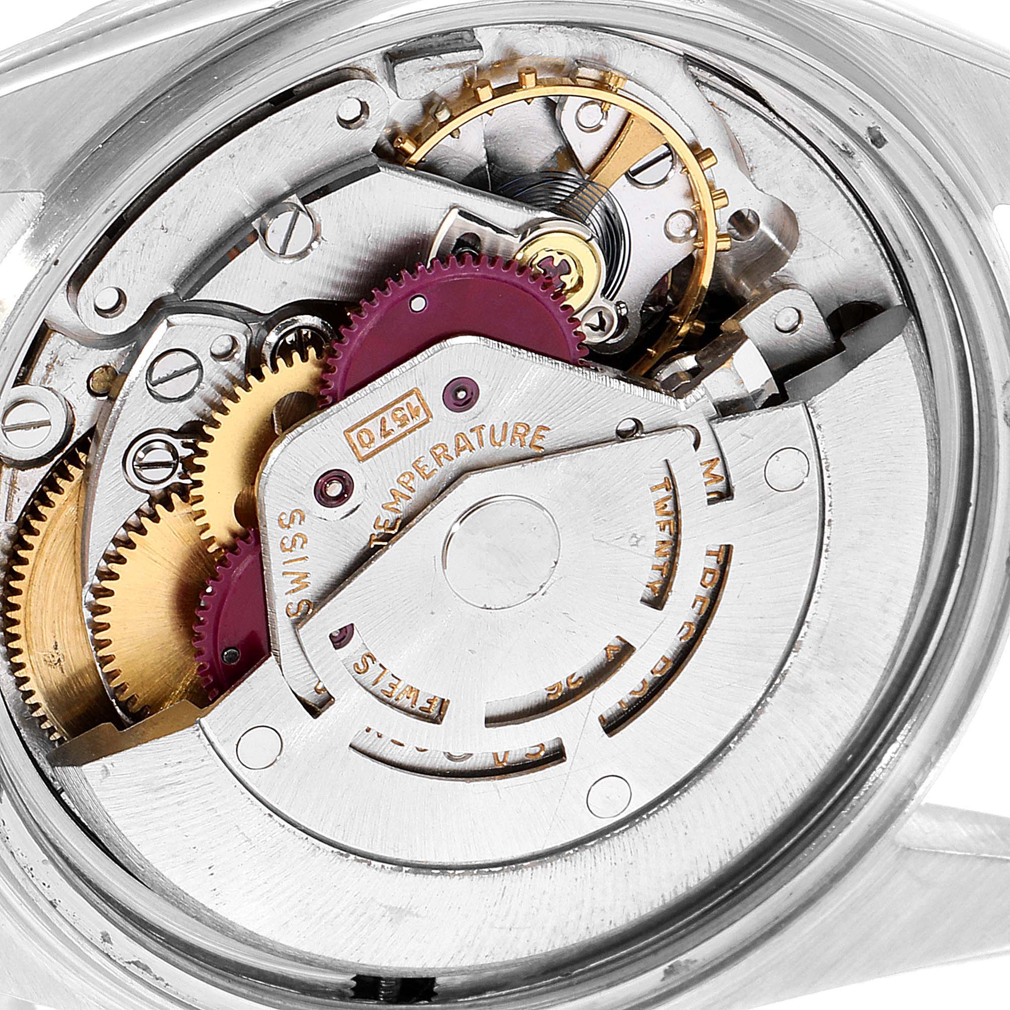 Close-up view showing the intricate internal mechanism of the Rolex Vintage Collection 1603 Men
s Steel and Gold (two tone) Champagne Dial 1603 Men
s Steel and Gold (two tone) Champagne Dial watch, highlighting gears and components.