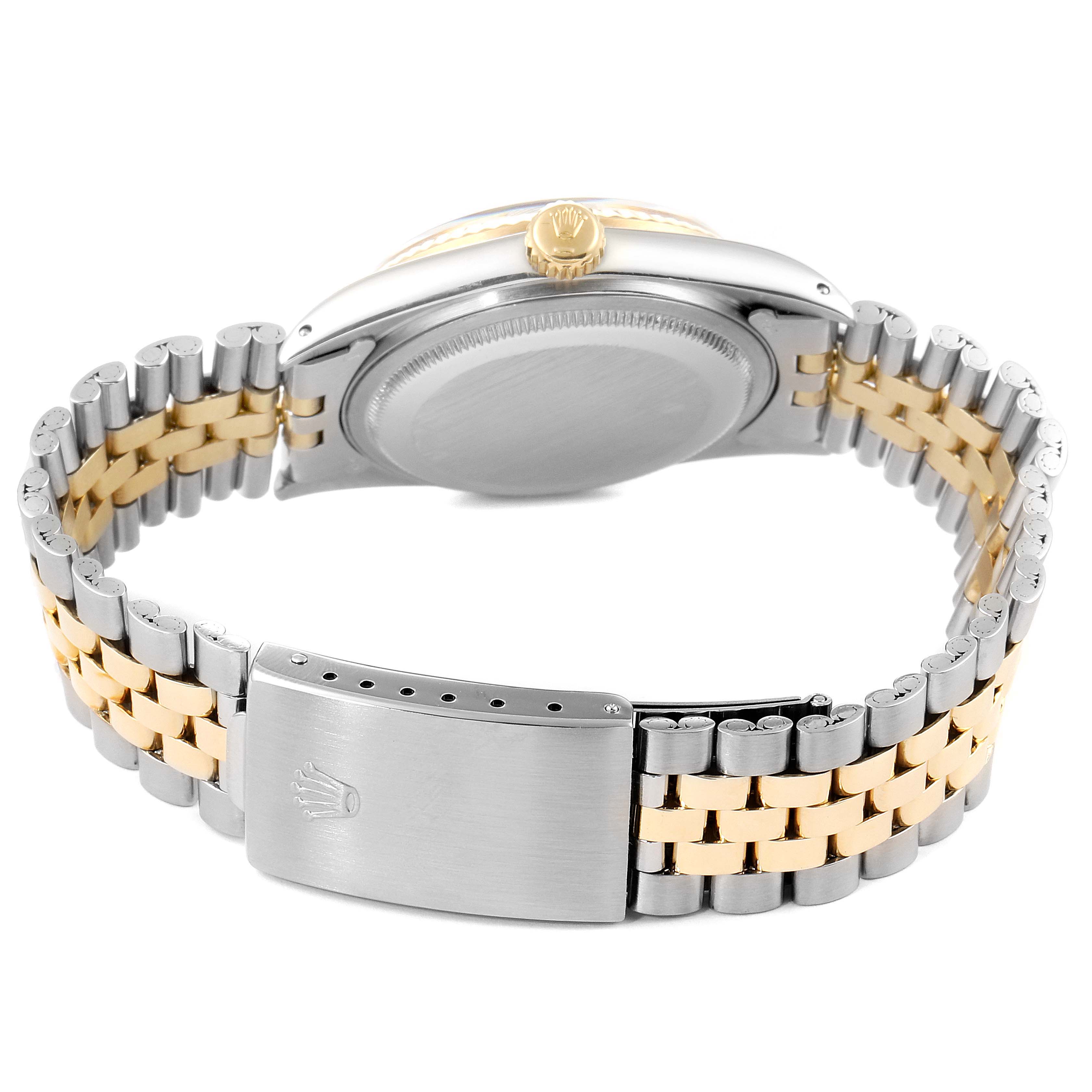 The image shows the back case and two-tone bracelet of the Rolex Vintage Collection 1603 Men
s Steel and Gold (two tone) Champagne Dial 1603 Men
s Steel and Gold (two tone) Champagne Dial model.