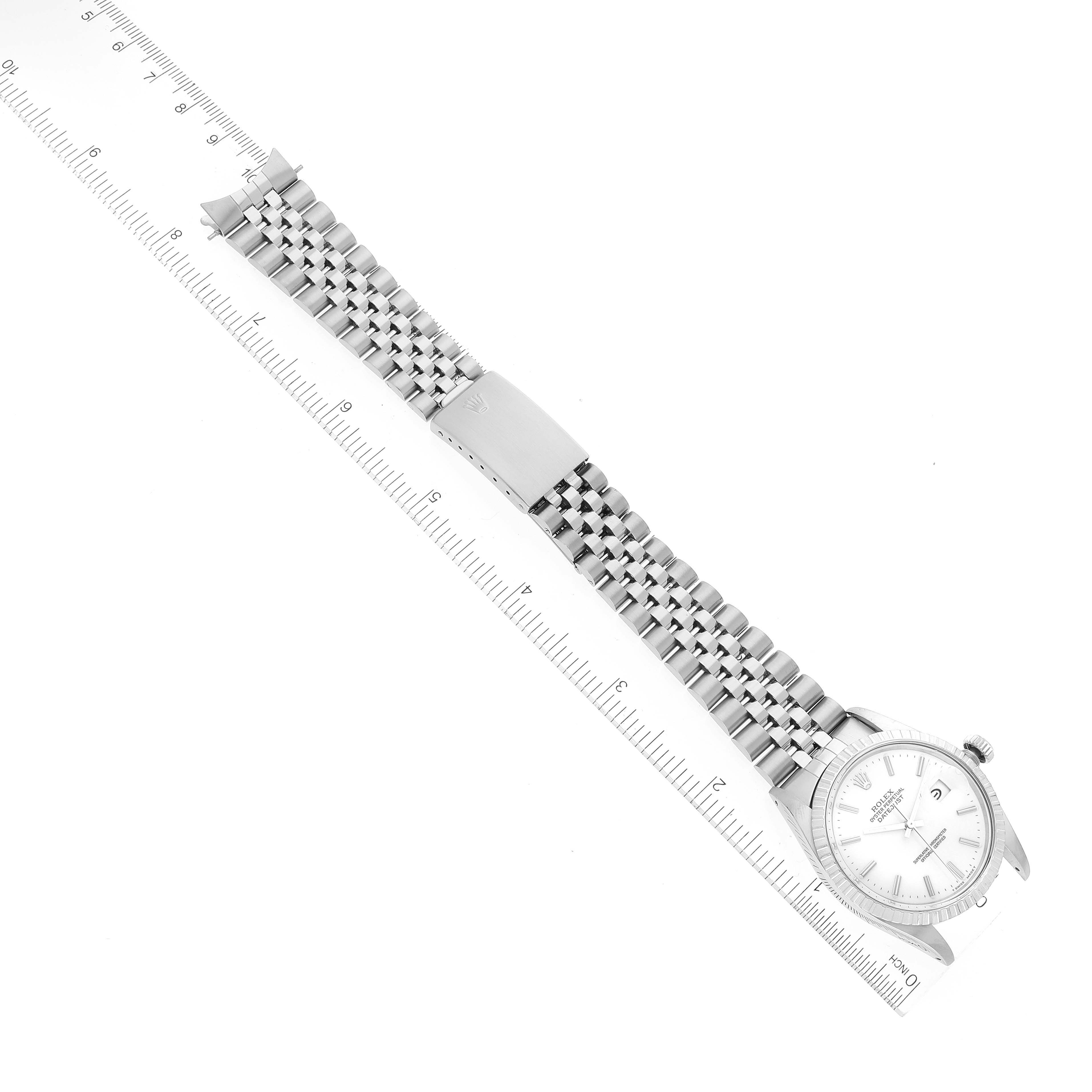 The image shows a top-down view of a Rolex Vintage Collection 16030 Men's Stainless Steel White Dial 16030 Men's Stainless Steel White Dial watch, focusing on its bracelet and clasp, with a ruler for scale.