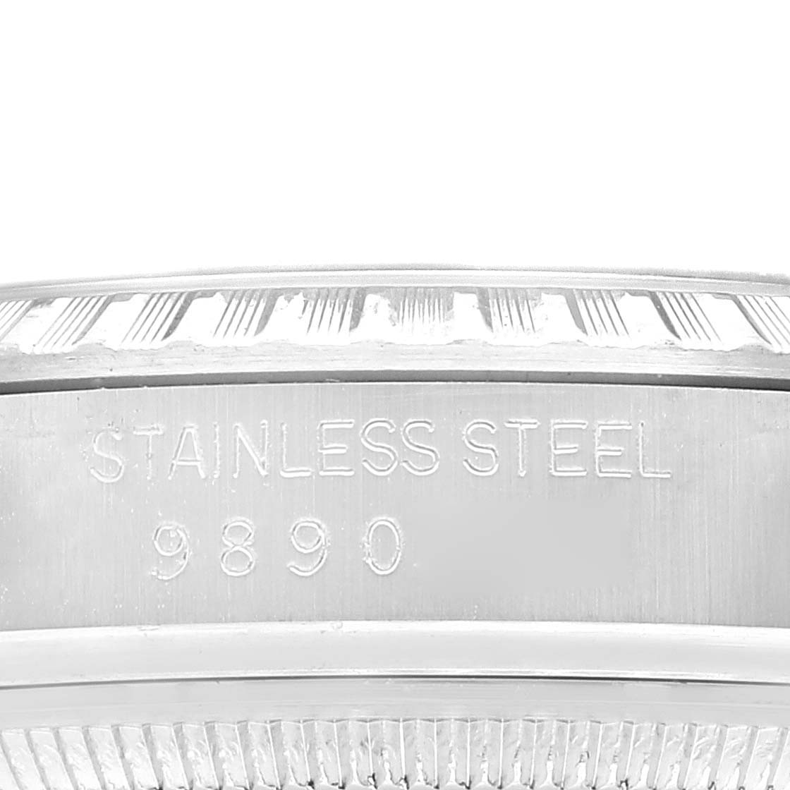 This image shows an engraved stainless steel case side of a Rolex Vintage Collection 16030 Men's Stainless Steel White Dial 16030 Men's Stainless Steel White Dial watch.