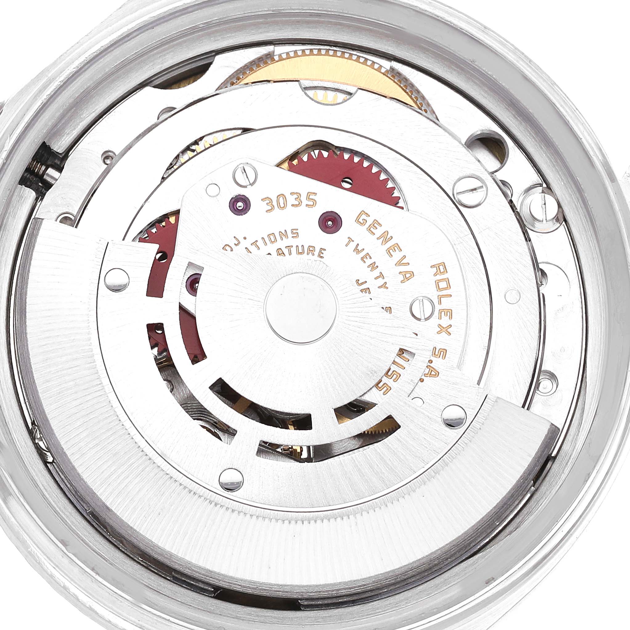The image shows the intricate internal mechanics of a Rolex Vintage Collection 16030 Men's Stainless Steel White Dial 16030 Men's Stainless Steel White Dial watch, focusing on the rotor, gears, and inscriptions at an overhead angle.