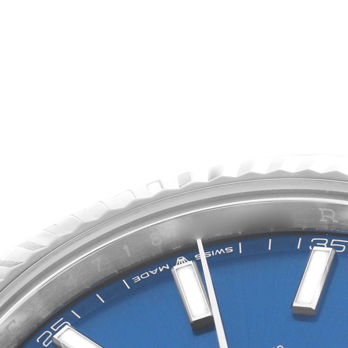 The image shows a close-up of the Rolex Datejust 41 126334 Men's Stainless Steel Blue Dial's dial and bezel from an angled side view.