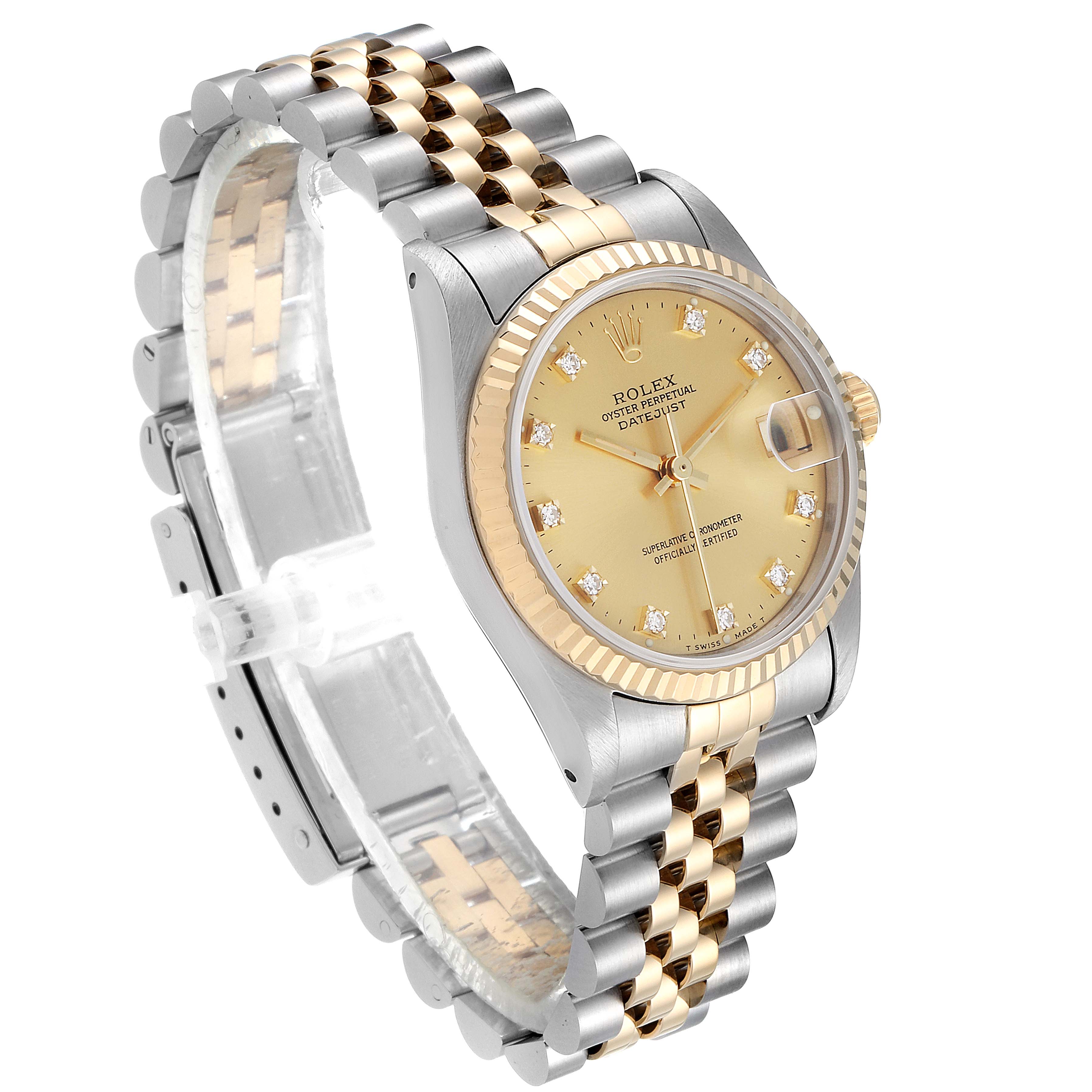 The image shows a Rolex Mid-Size 68273 Women's Steel and Gold (two tone) Champagne Dial 68273 Women's Steel and Gold (two tone) Champagne Dial Oyster Perpetual Datejust from an angled side view, highlighting its gold and silver bracelet, fluted bezel, and champagne dial.