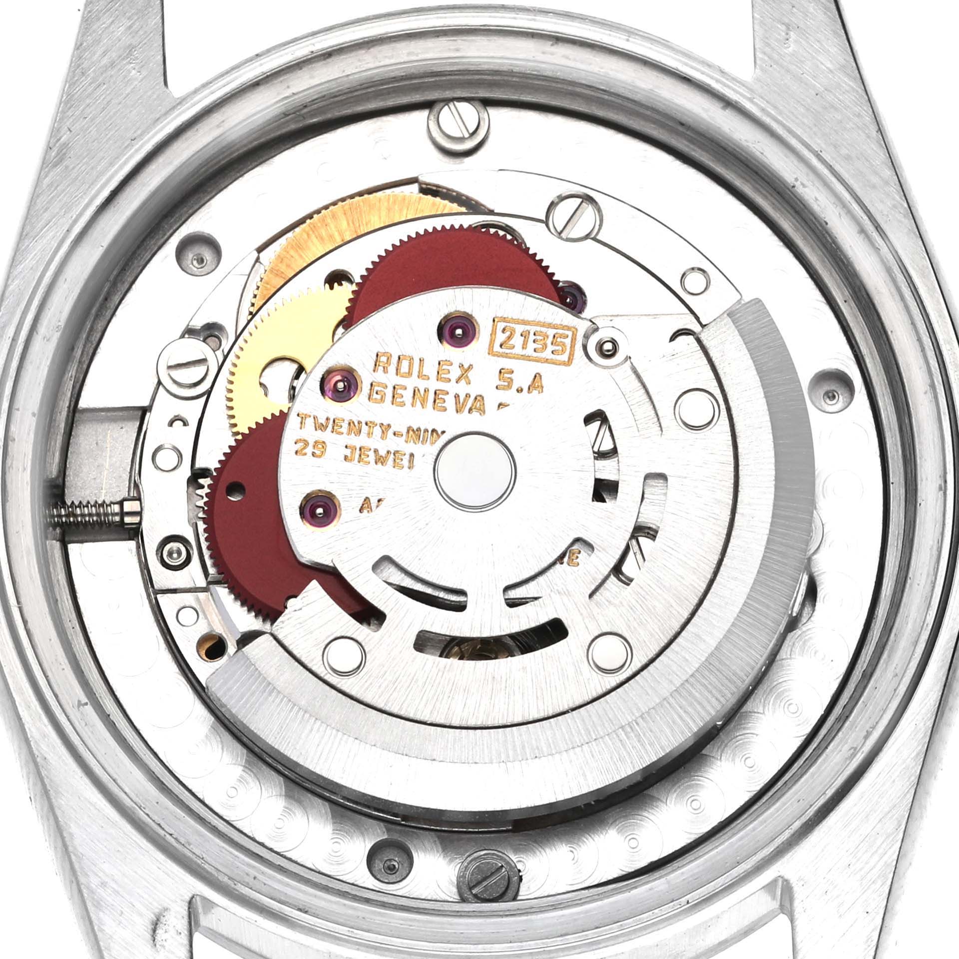 The image shows the back view of the Rolex Mid-Size 68274 Women's Stainless Steel Silver Dial 68274 Women's Stainless Steel Silver Dial model, highlighting the movement and the engraved rotor.