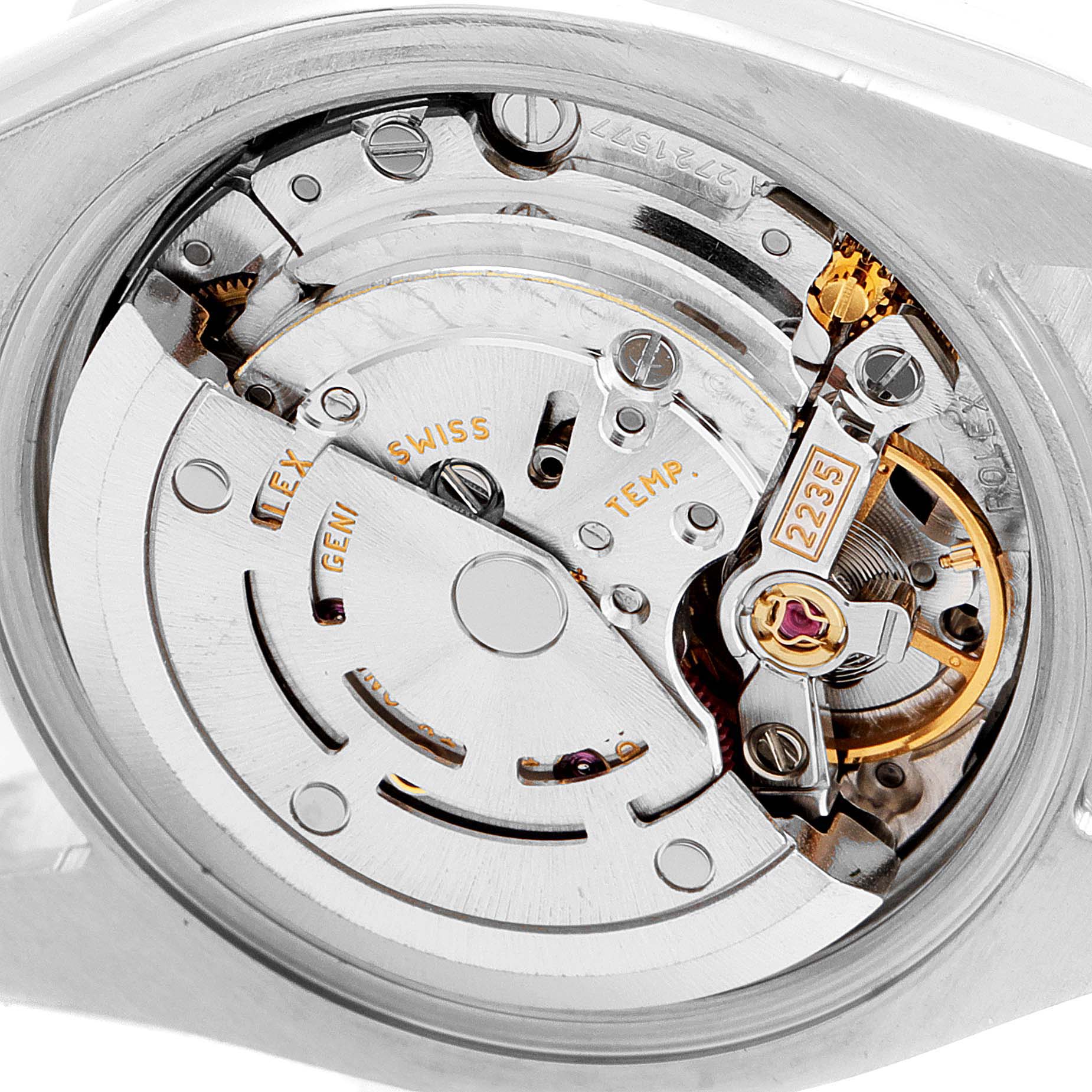 The image shows a close-up of the Rolex Datejust 179171 Women
s Steel and Gold (two tone) Silver Dial 179171 Women
s Steel and Gold (two tone) Silver Dial model
s internal automatic movement mechanism.