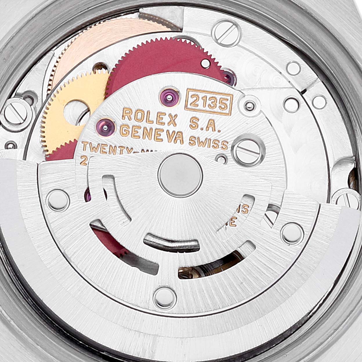 This image shows the intricate internal movement of the Rolex Datejust 69174 Women's Stainless Steel Blue Dial 69174 Women's Stainless Steel Blue Dial watch, including gears and the oscillating weight.