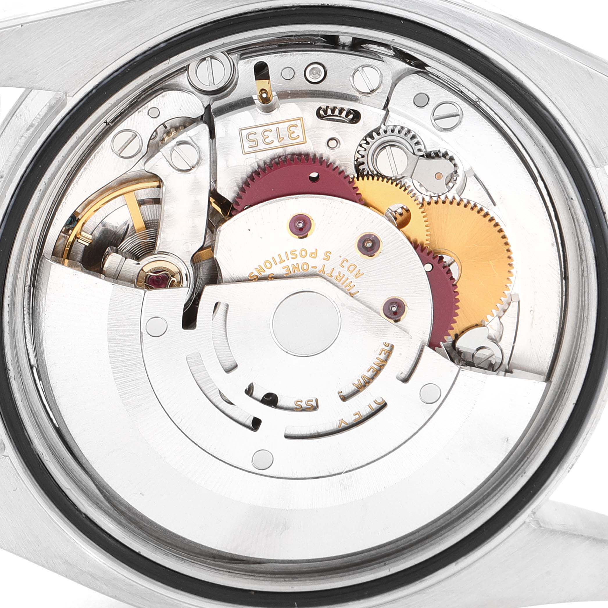 This image shows a close-up view of the movement mechanism inside the Rolex Datejust 116234 Men
s Stainless Steel Silver Dial 116234 Men
s Stainless Steel Silver Dial watch model.