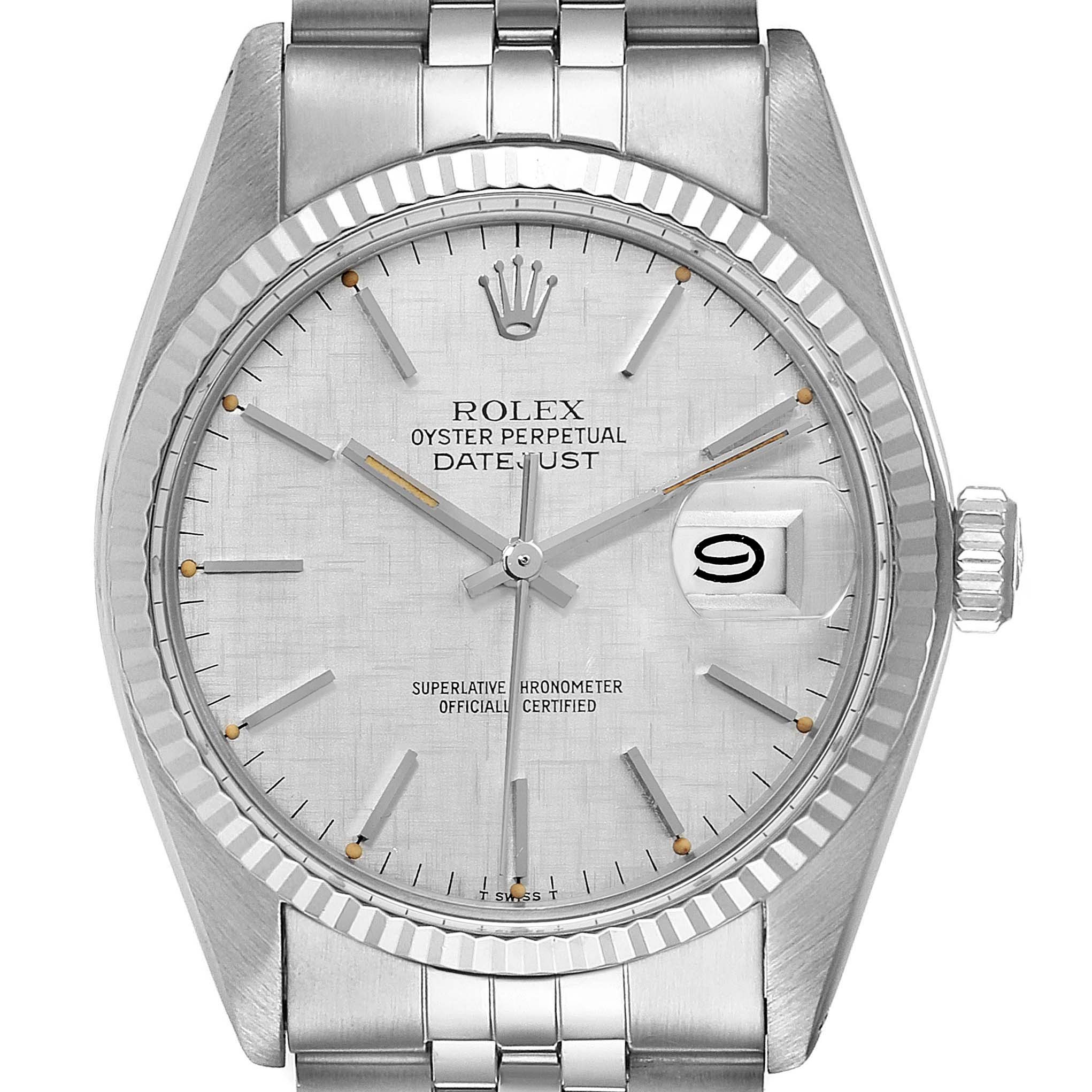 The image shows a front view of the Rolex Vintage Collection 16014 Men's Stainless Steel Silver Dial 16014 Men's Stainless Steel Silver Dial Oyster Perpetual Datejust watch, highlighting the dial, hands, date window, and part of the bracelet.