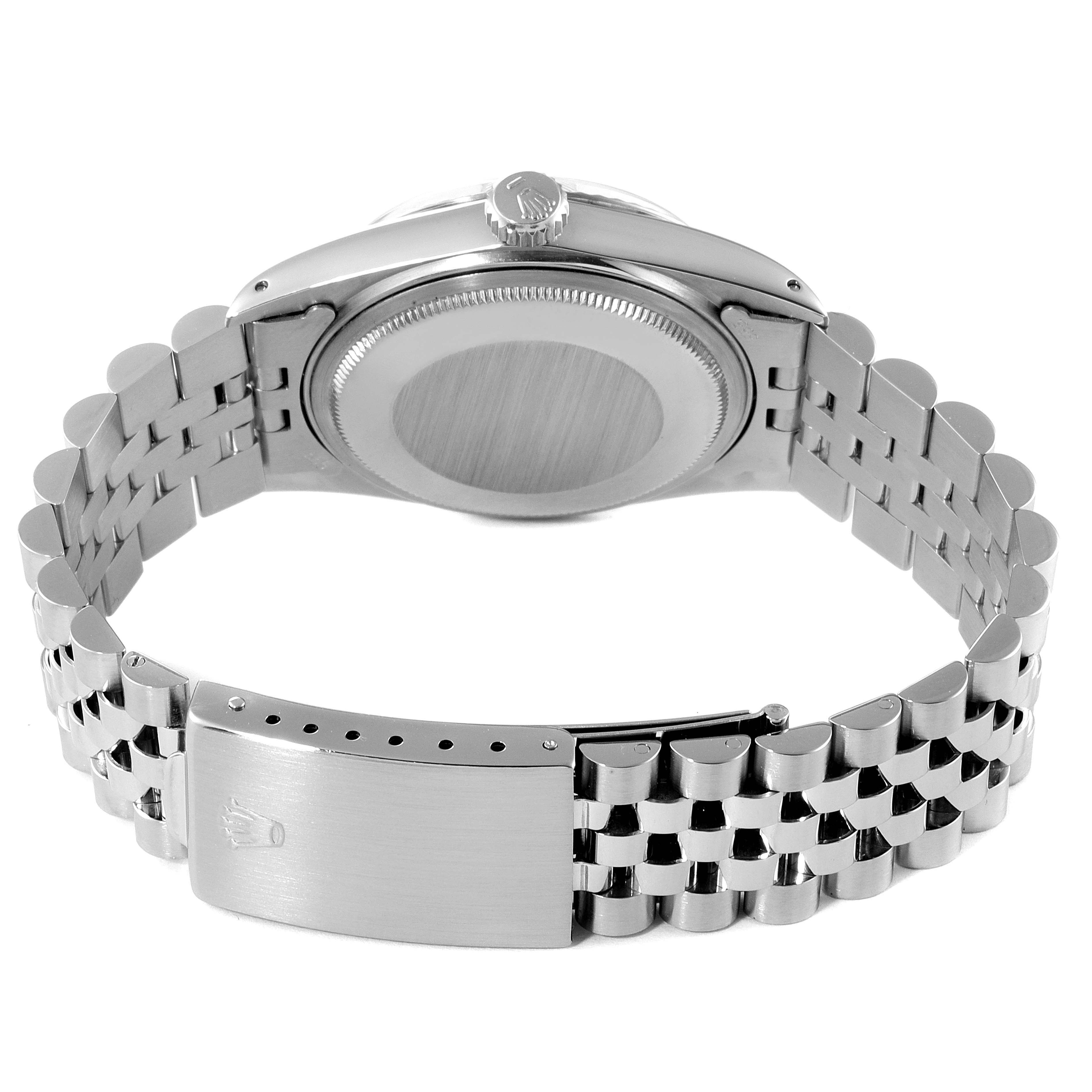 The image shows the back view of a Rolex Vintage Collection 16014 Men's Stainless Steel Silver Dial 16014 Men's Stainless Steel Silver Dial watch, highlighting the bracelet and caseback.