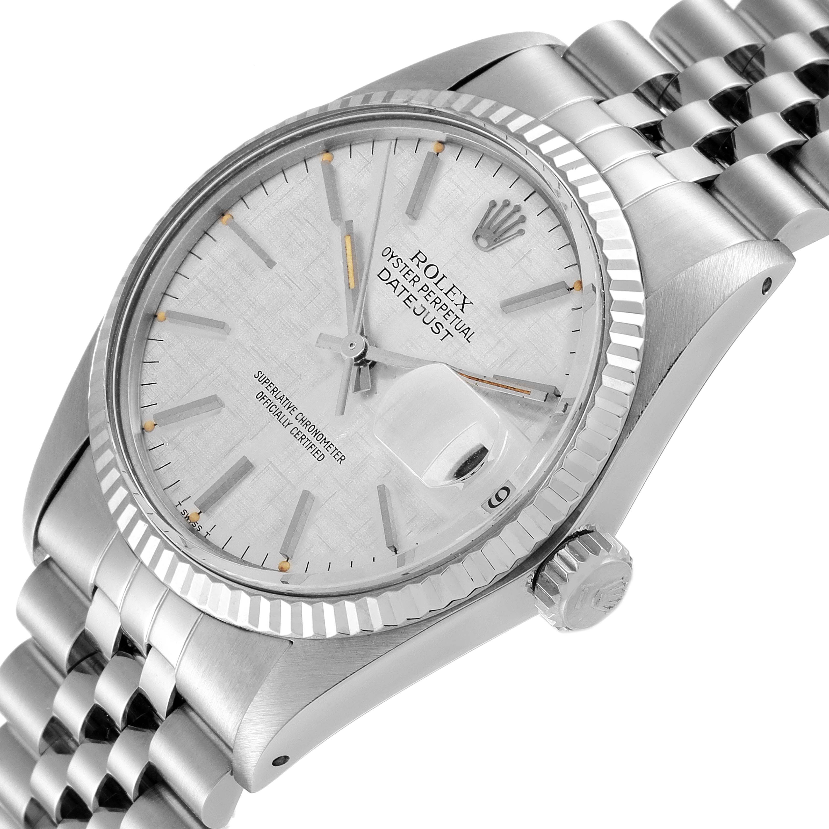 This image shows a close-up, angled view of the face, crown, and bracelet of a Rolex Vintage Collection 16014 Men's Stainless Steel Silver Dial 16014 Men's Stainless Steel Silver Dial model Datejust watch.