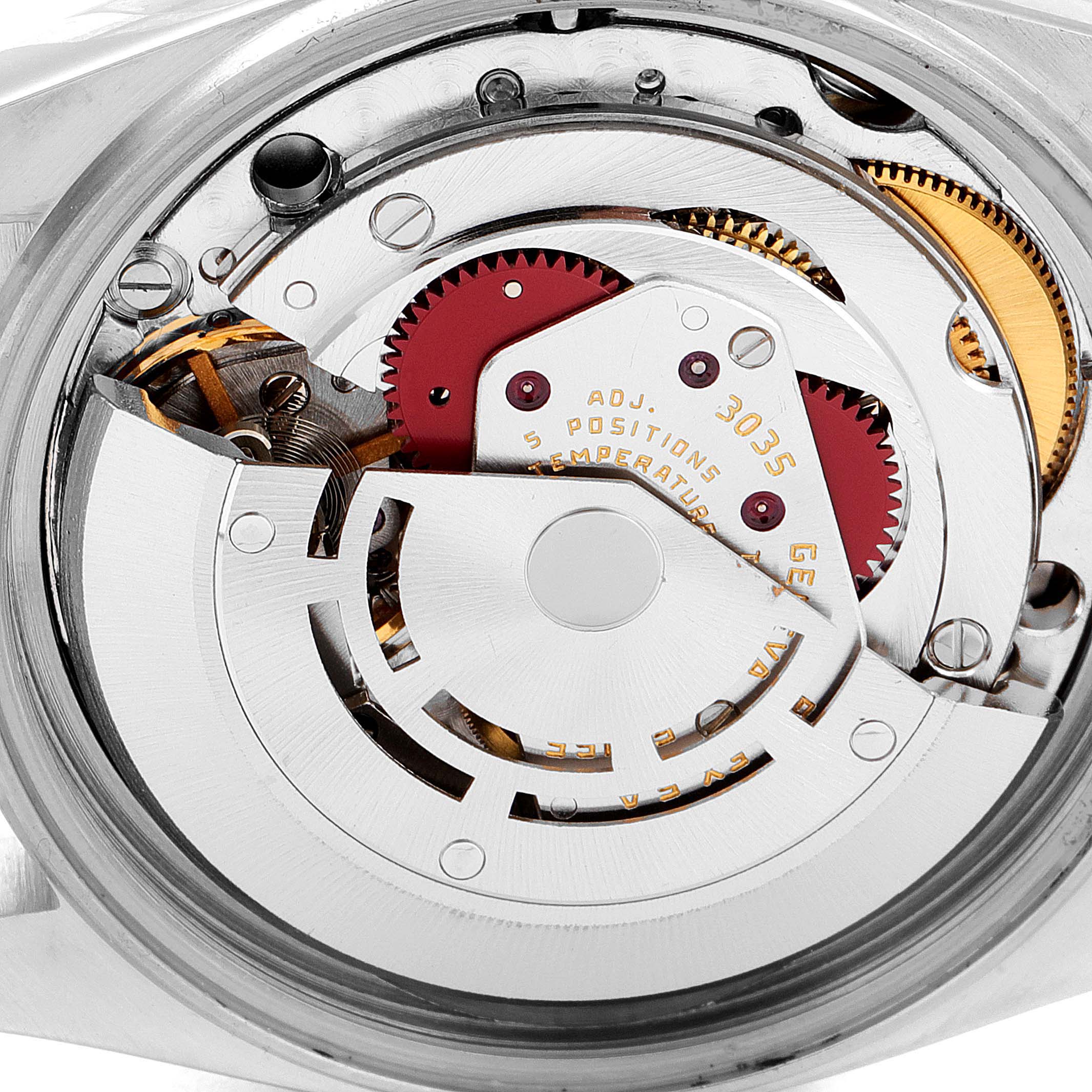 This image shows the intricate inner mechanism of a Rolex Vintage Collection 16014 Men's Stainless Steel Silver Dial 16014 Men's Stainless Steel Silver Dial watch viewed from the back.